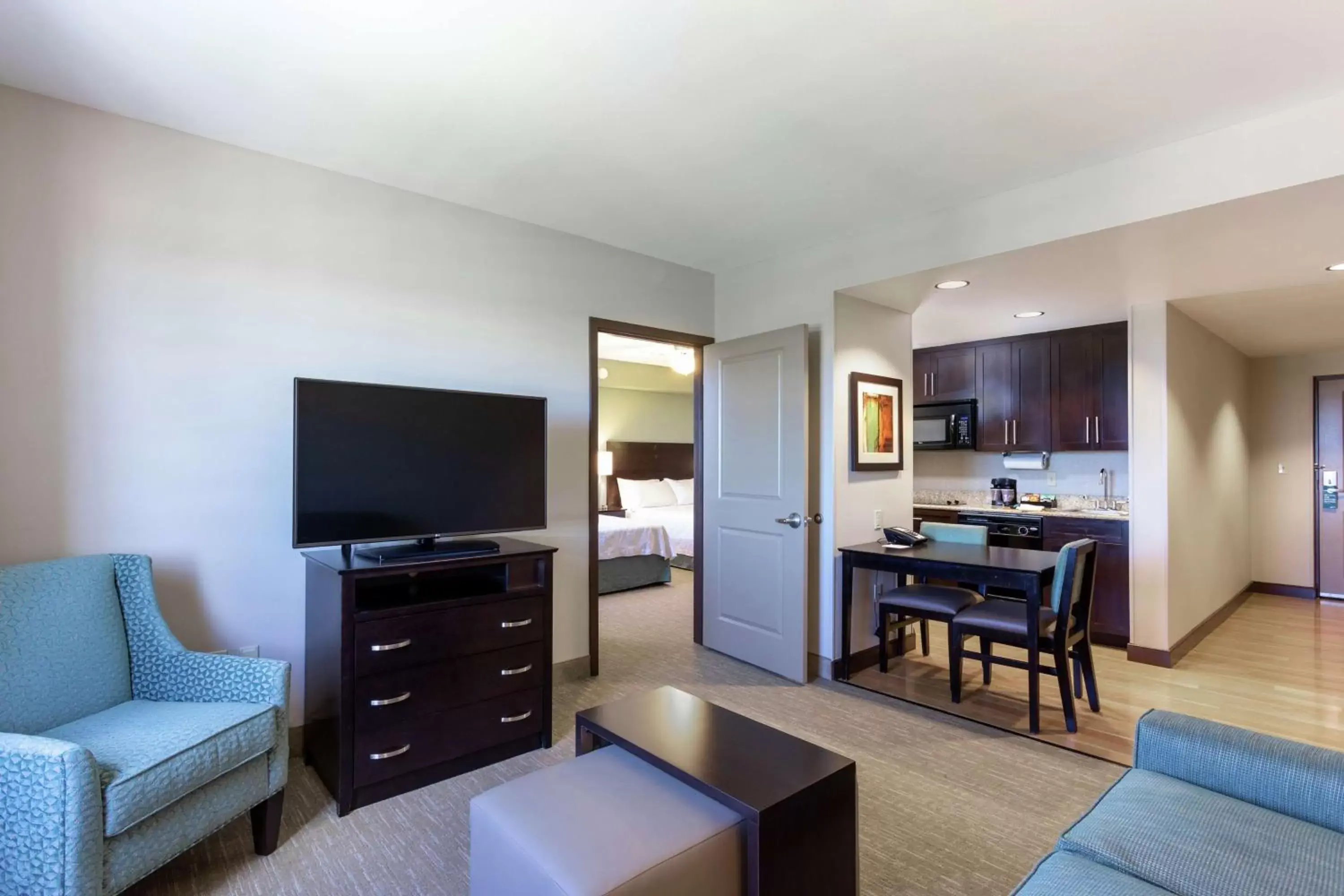 Bedroom, TV/Entertainment Center in Homewood Suites Port Saint Lucie-Tradition