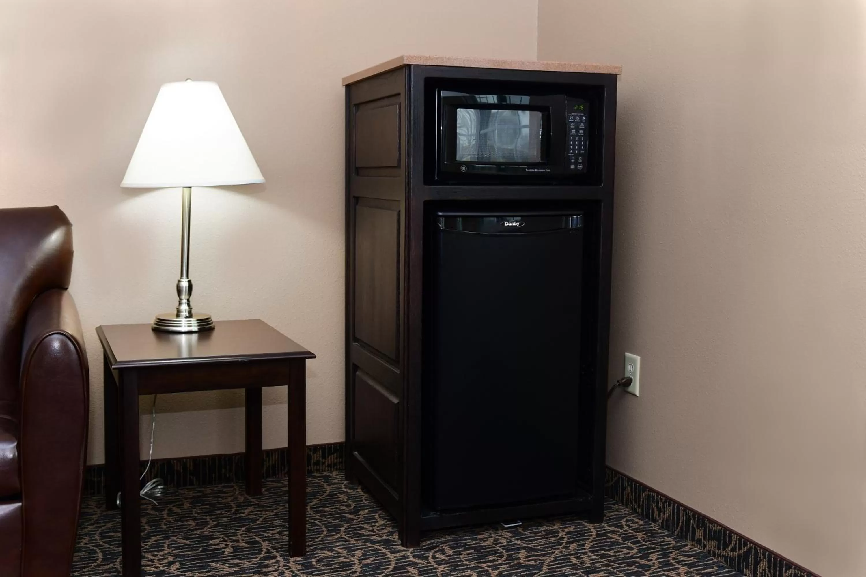 Living room in Cobblestone Inn & Suites - Denison | Majestic Hills