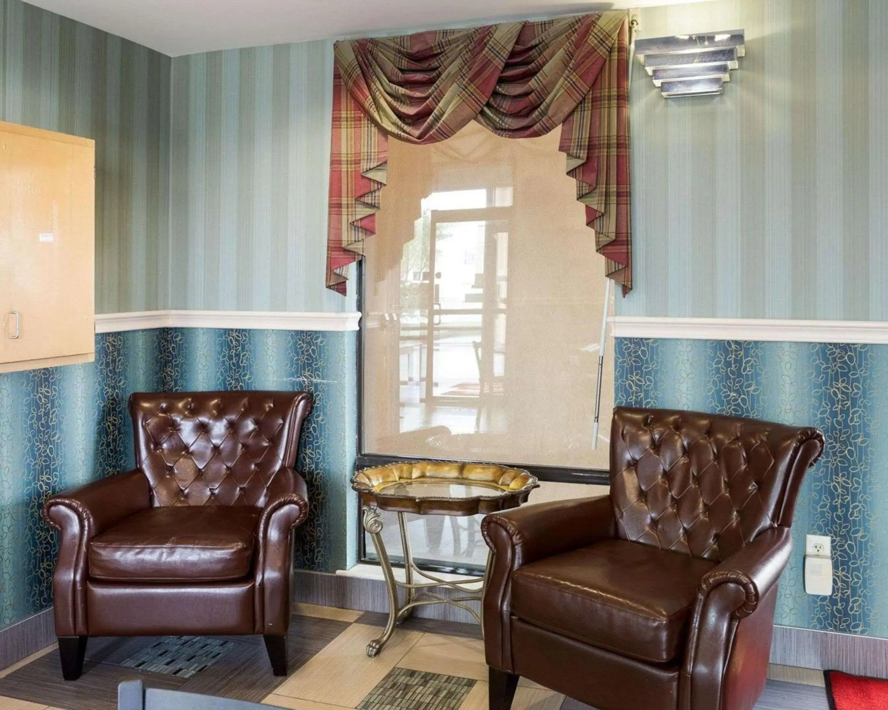 Lobby or reception, Seating Area in Rodeway Inn & Suites