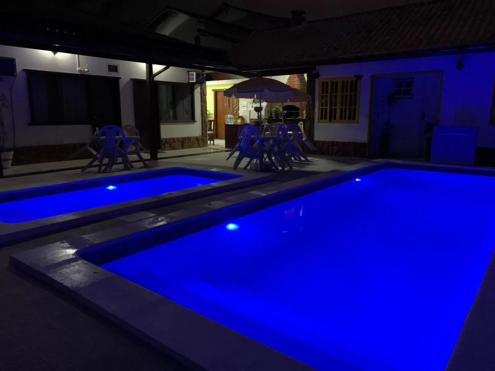 Swimming pool in Pousada Fazendinha Unamar