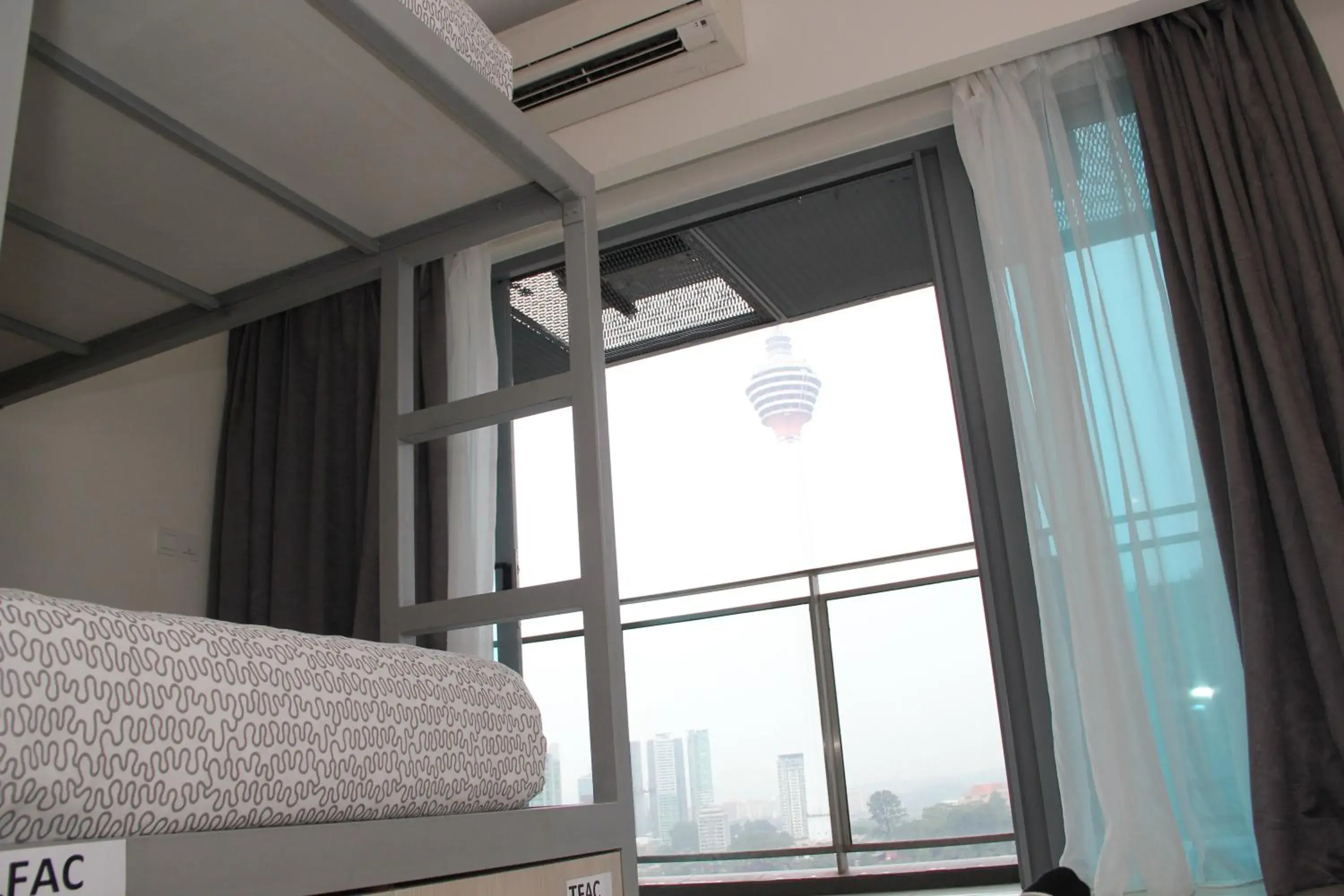 Landmark view, Bunk Bed in Summer Suites Residences by Subhome