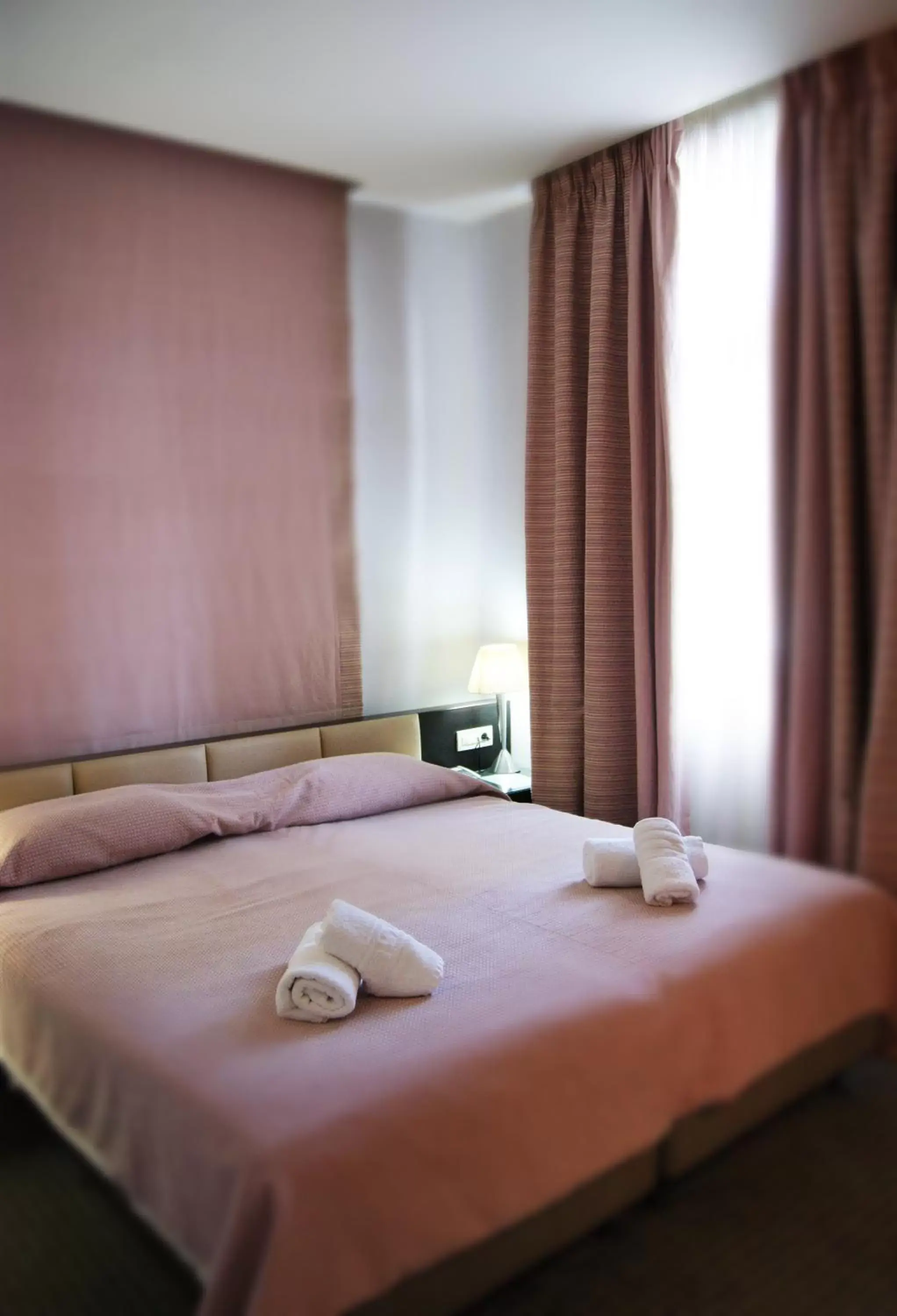 Bed in Palladion Boutique Hotel