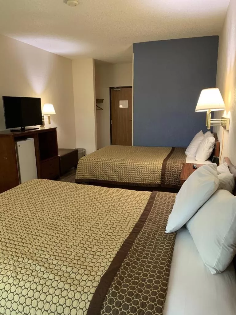 Bed in Days Inn by Wyndham Topeka