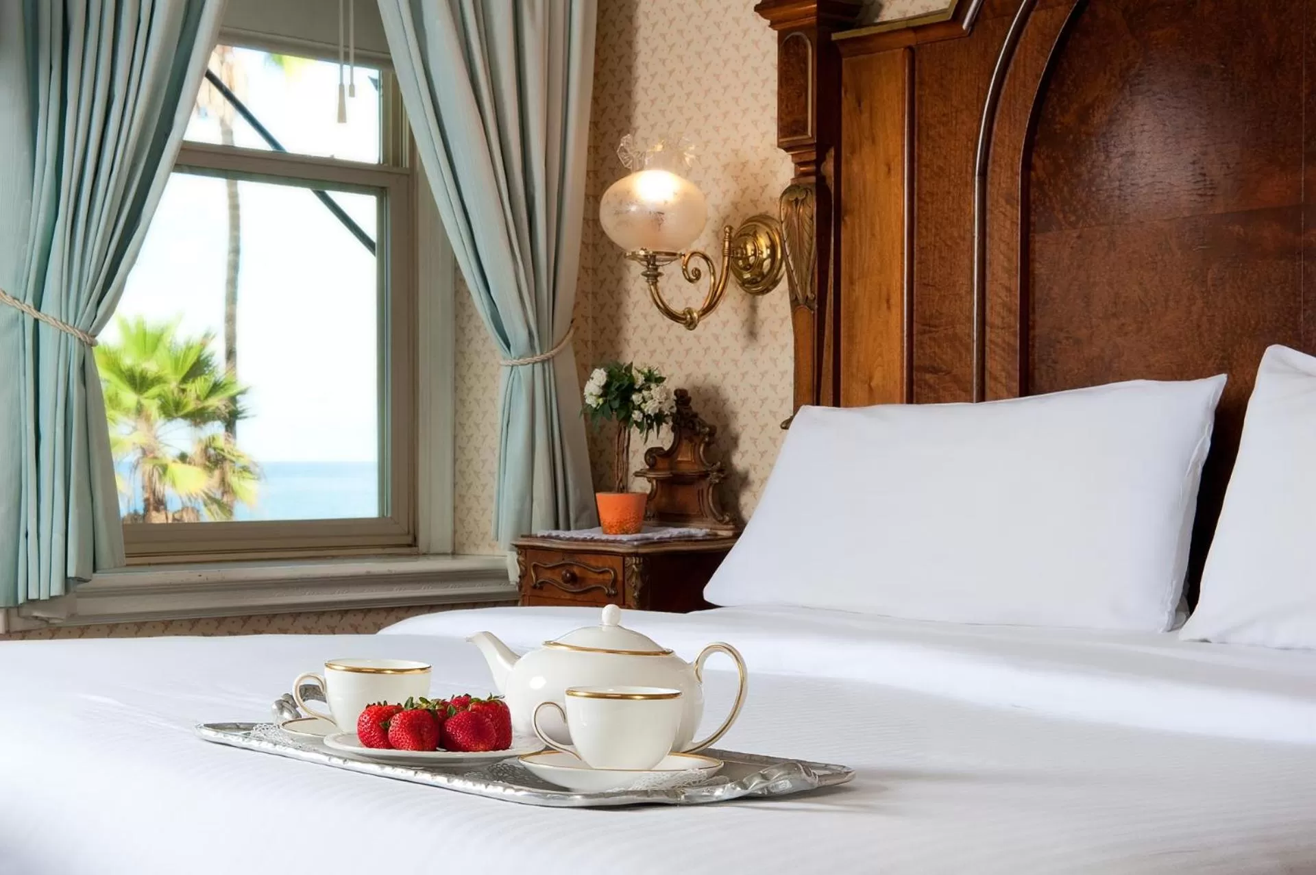 Bed in Doryman's Oceanfront Inn