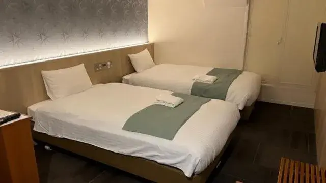 Bed in Hotel Shinjukuya