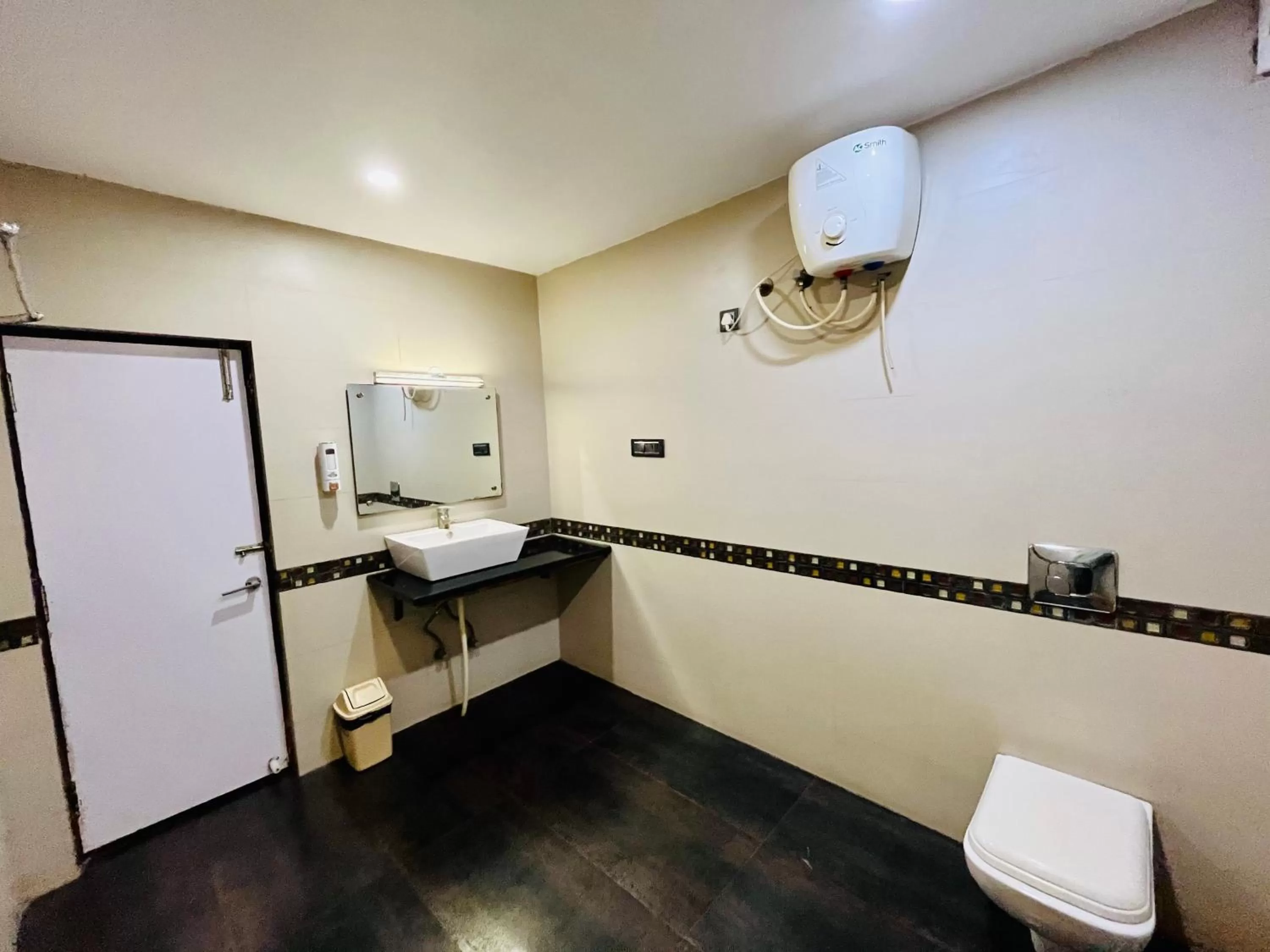 Toilet in Shankar Bhavan By Vinayak Hotels