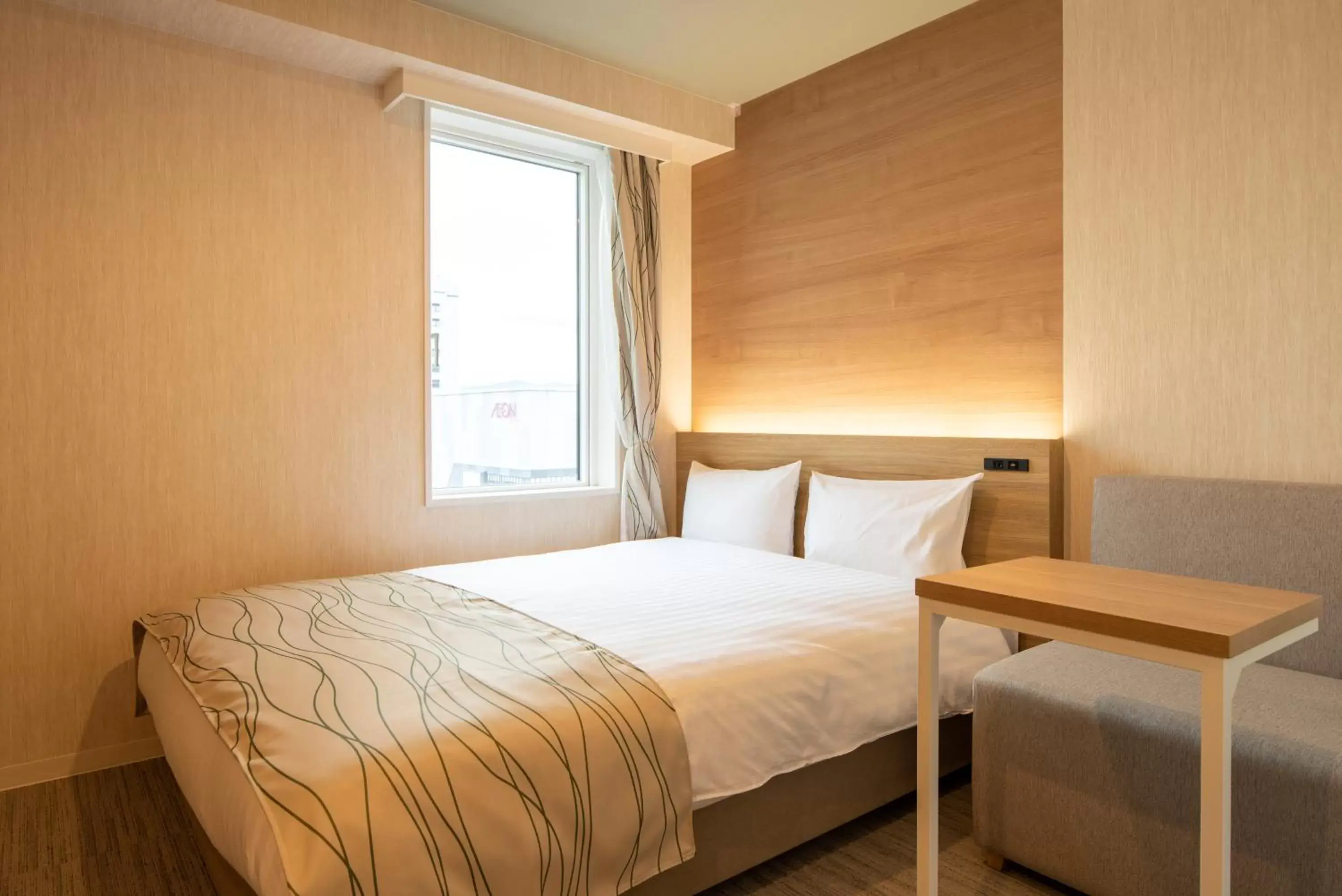 Bed in HOTEL AMANEK Asahikawa Bed in HOTEL AMANEK Asahikawa