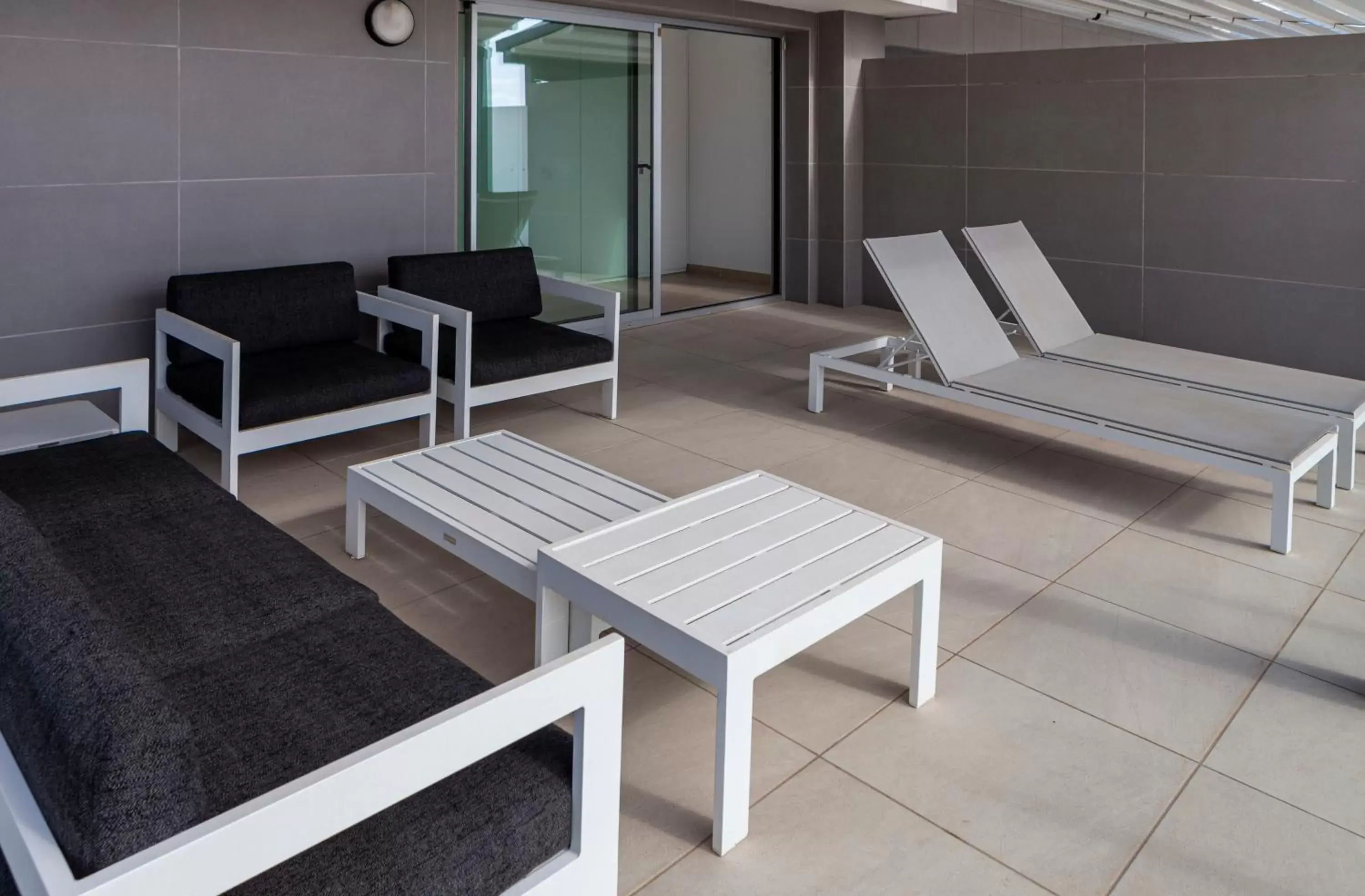 Balcony/Terrace, Seating Area in Blue Line Apartment Hotel