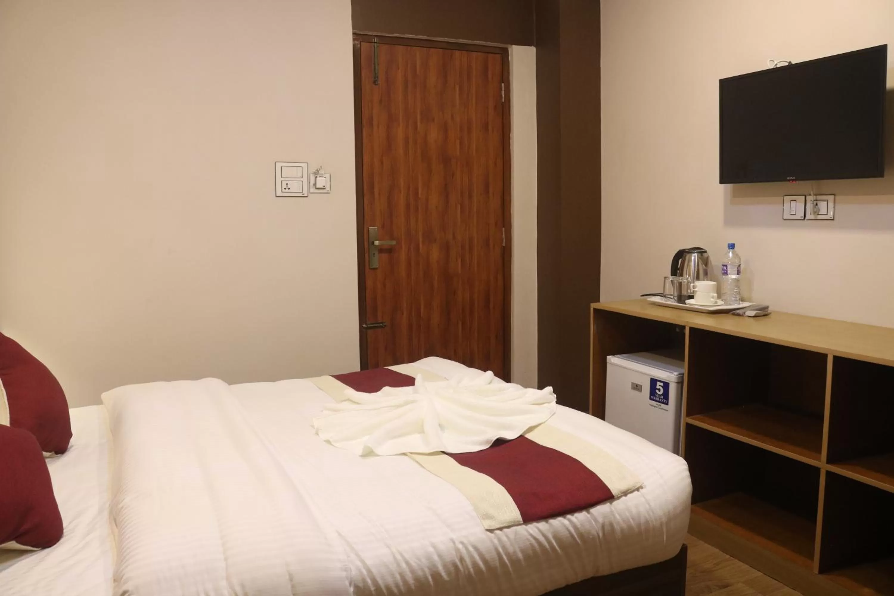 Bedroom, Bed in Hotel Family Ties Pvt. Ltd.