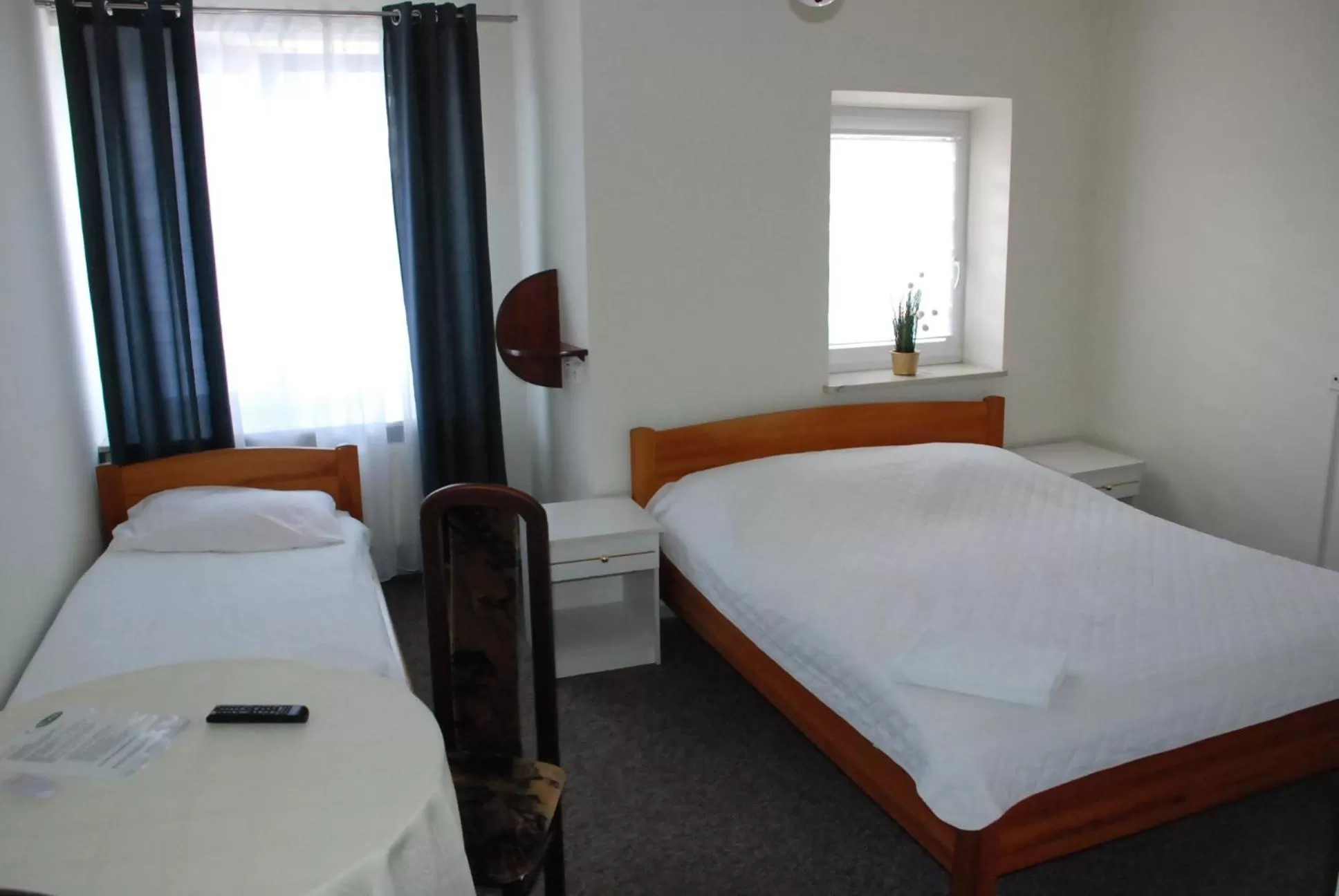 Bed in Hotelik Manhatan