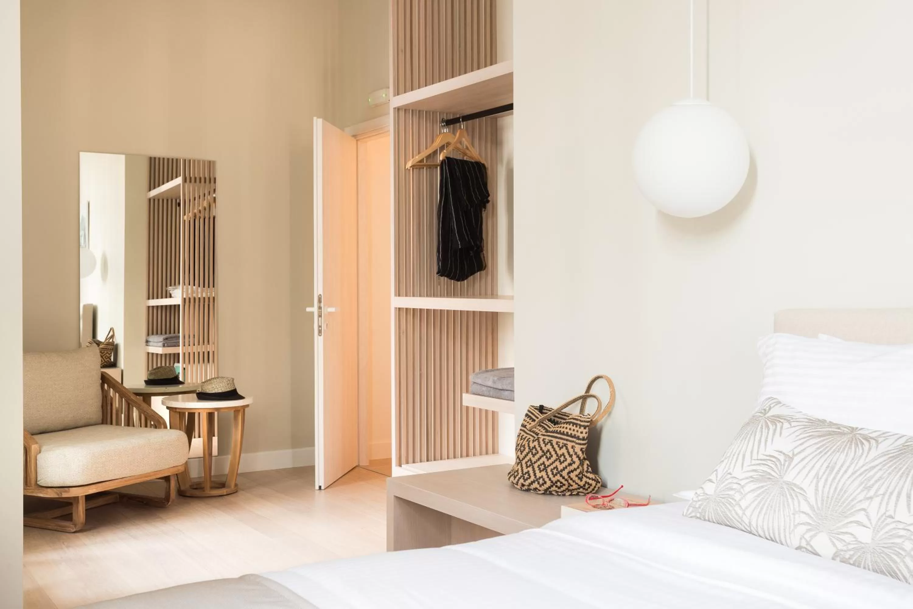 Bed, Seating Area in SYROS SOUL LUXURY SUITES