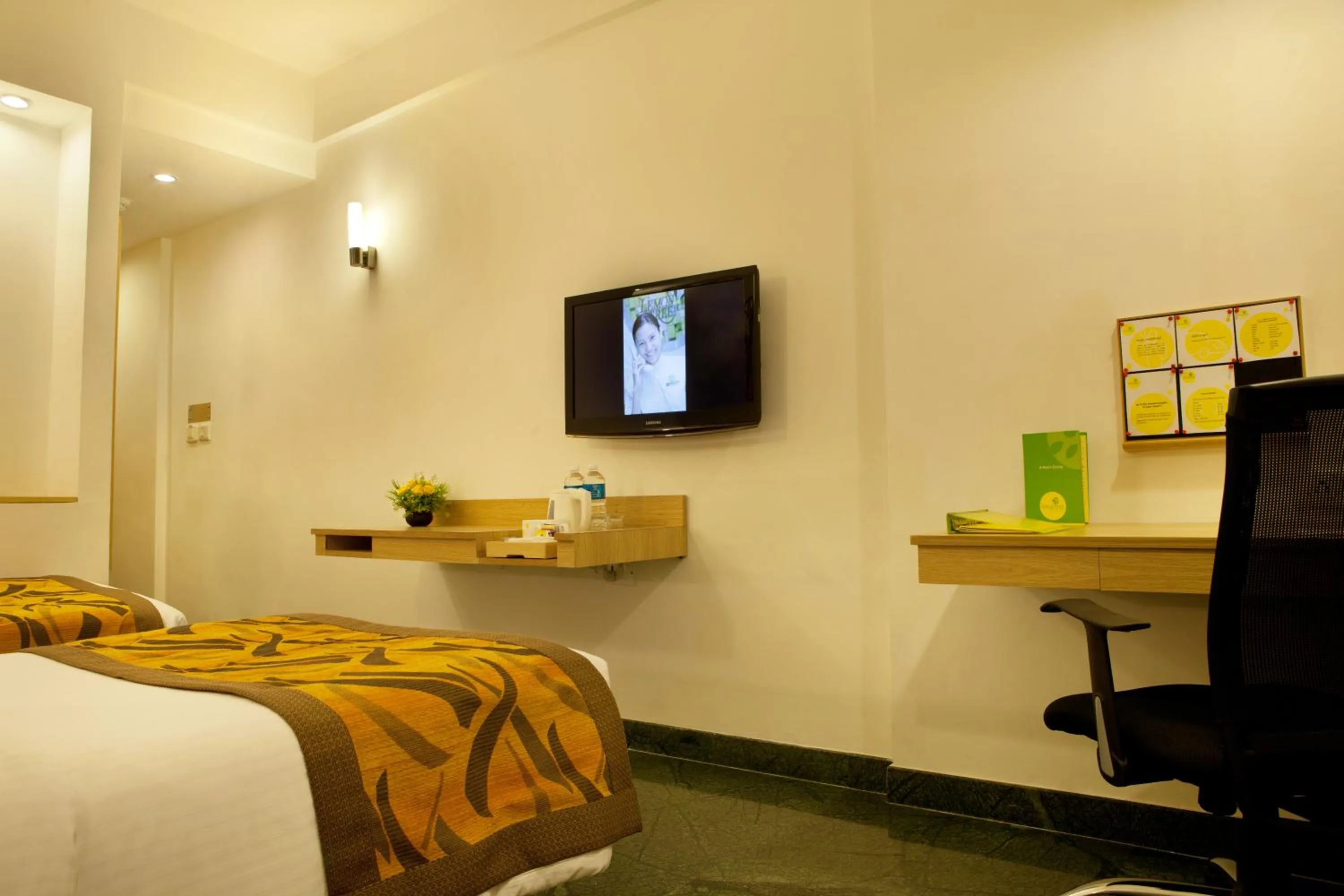 Photo of the whole room, Bed in Lemon Tree Hotel, Udyog Vihar, Gurugram