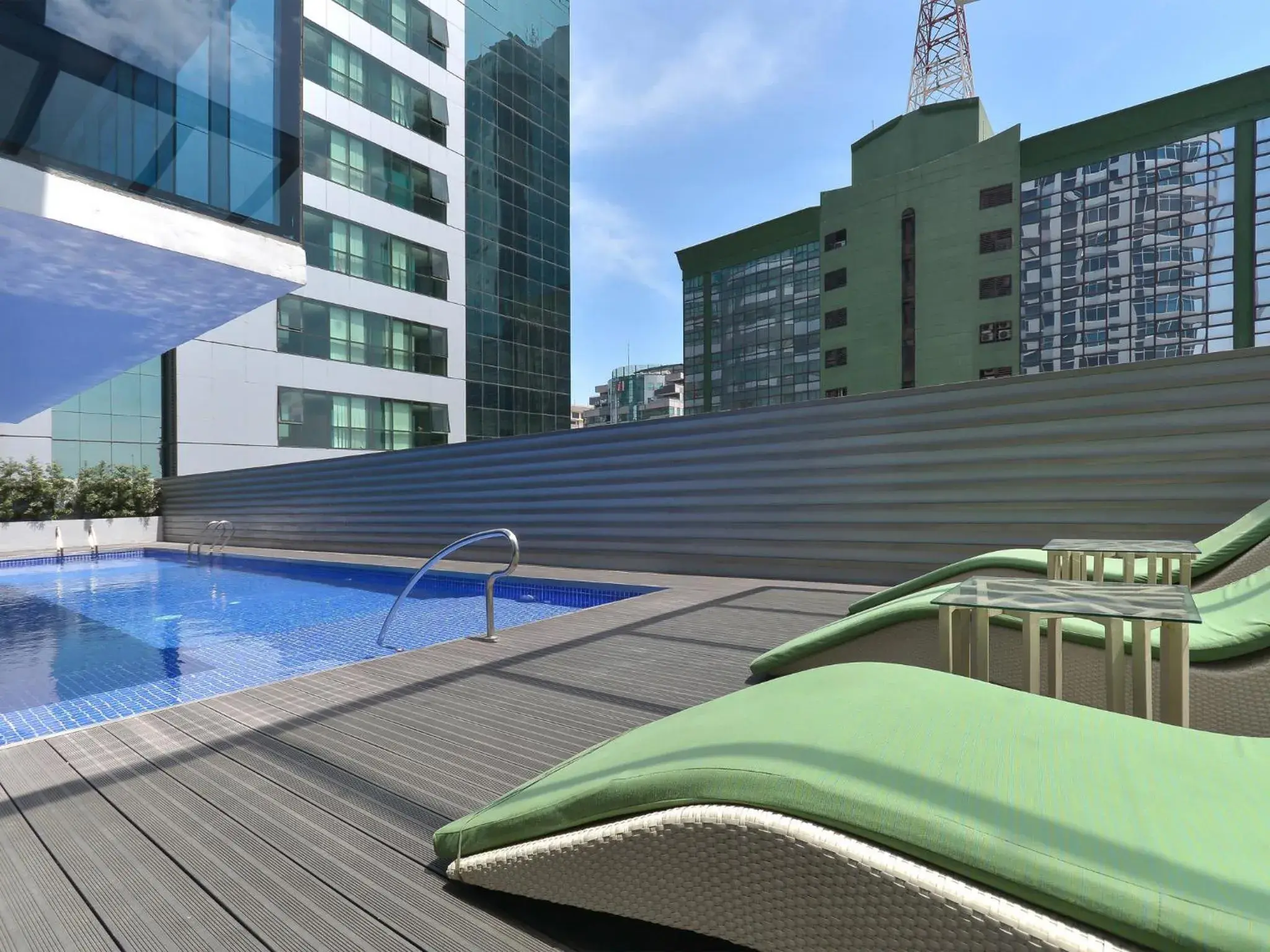 Swimming pool, Property Building in Currency Serviced Suites