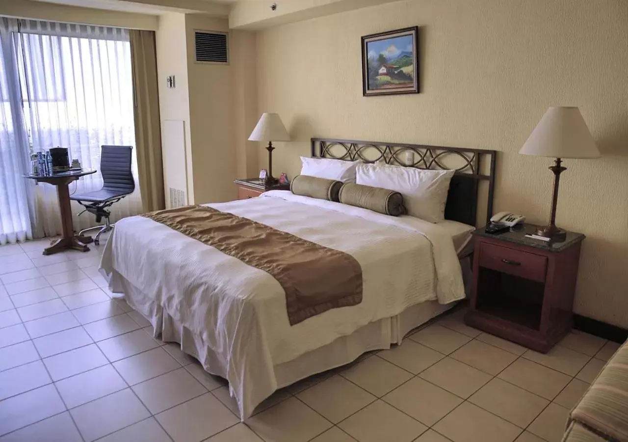 Photo of the whole room, Bed in Wyndham San Jose Herradura