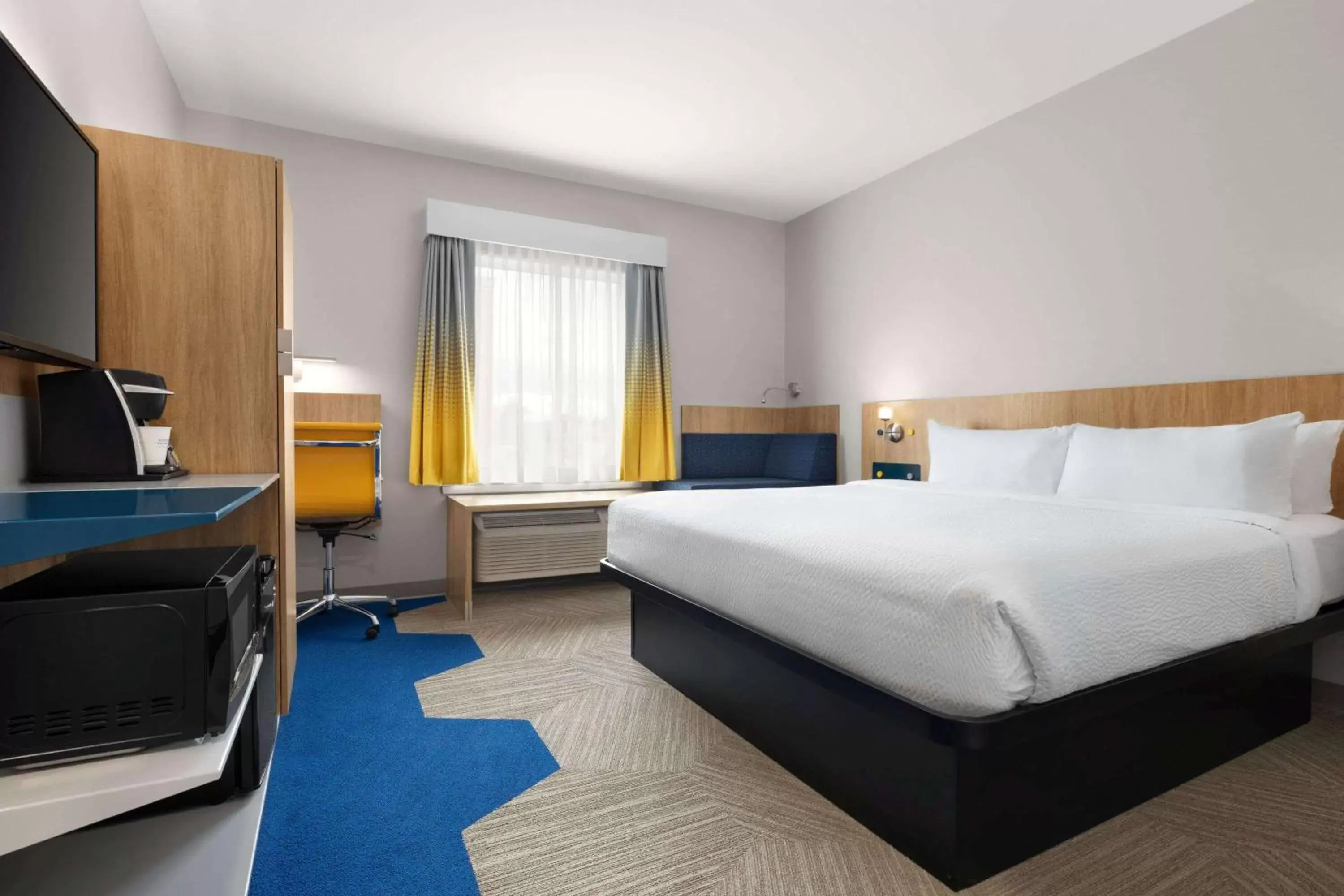 Photo of the whole room, Bed in Microtel Inn Suites by Wyndham Lac-Megantic Photo of the whole room, Bed in Microtel Inn Suites by Wyndham Lac-Megantic