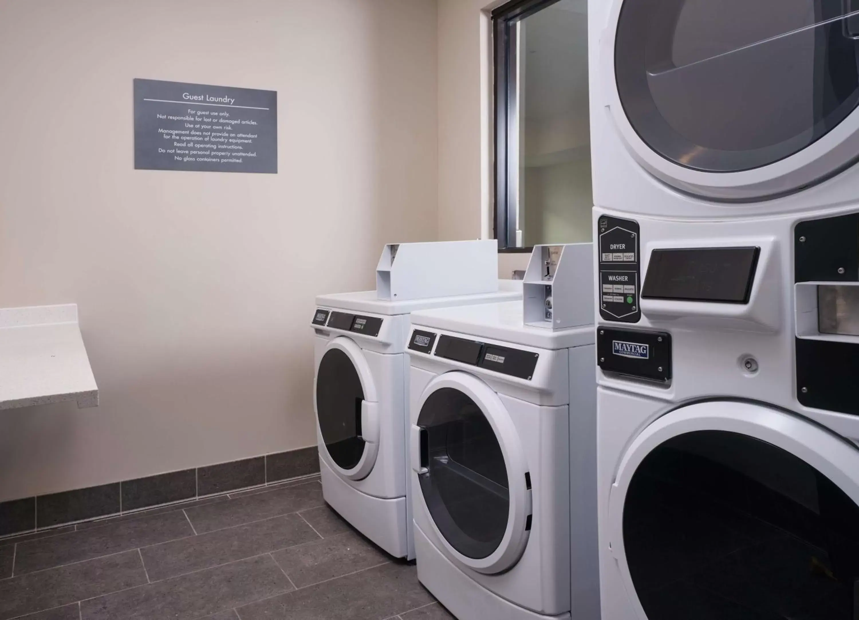 laundry, TV/Entertainment Center in Best Western Plus Executive Residency Jackson Northeast