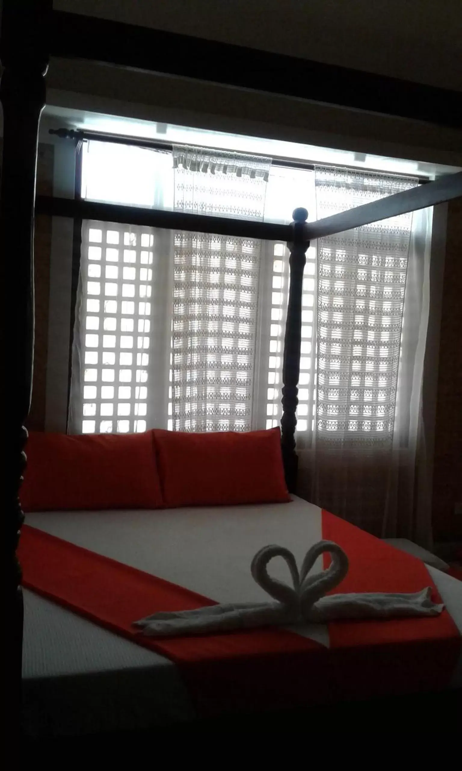 Bed, Seating Area in Orange Mangrove Pension House