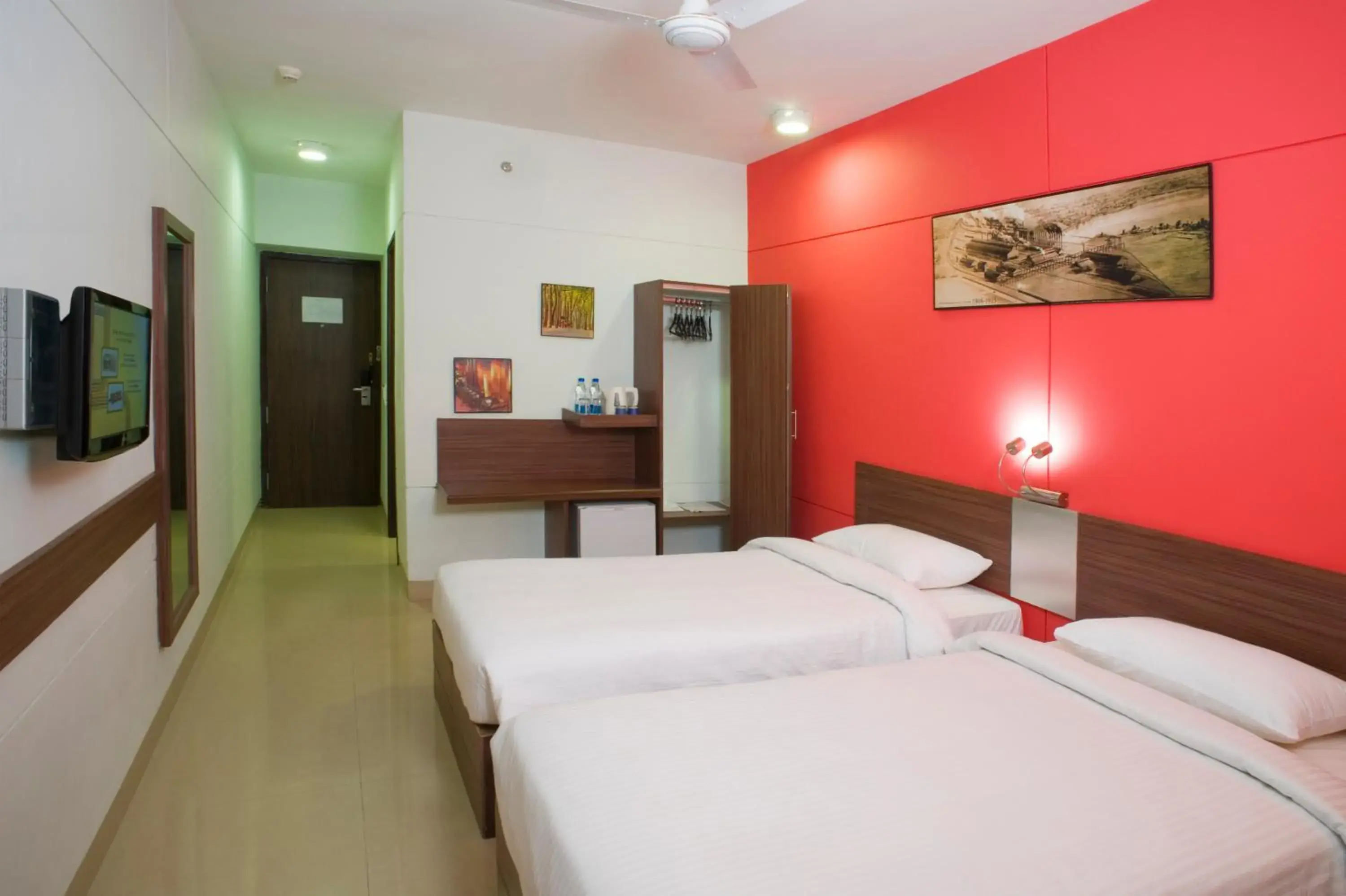 Photo of the whole room, Bed in Ginger Hotel Mangalore