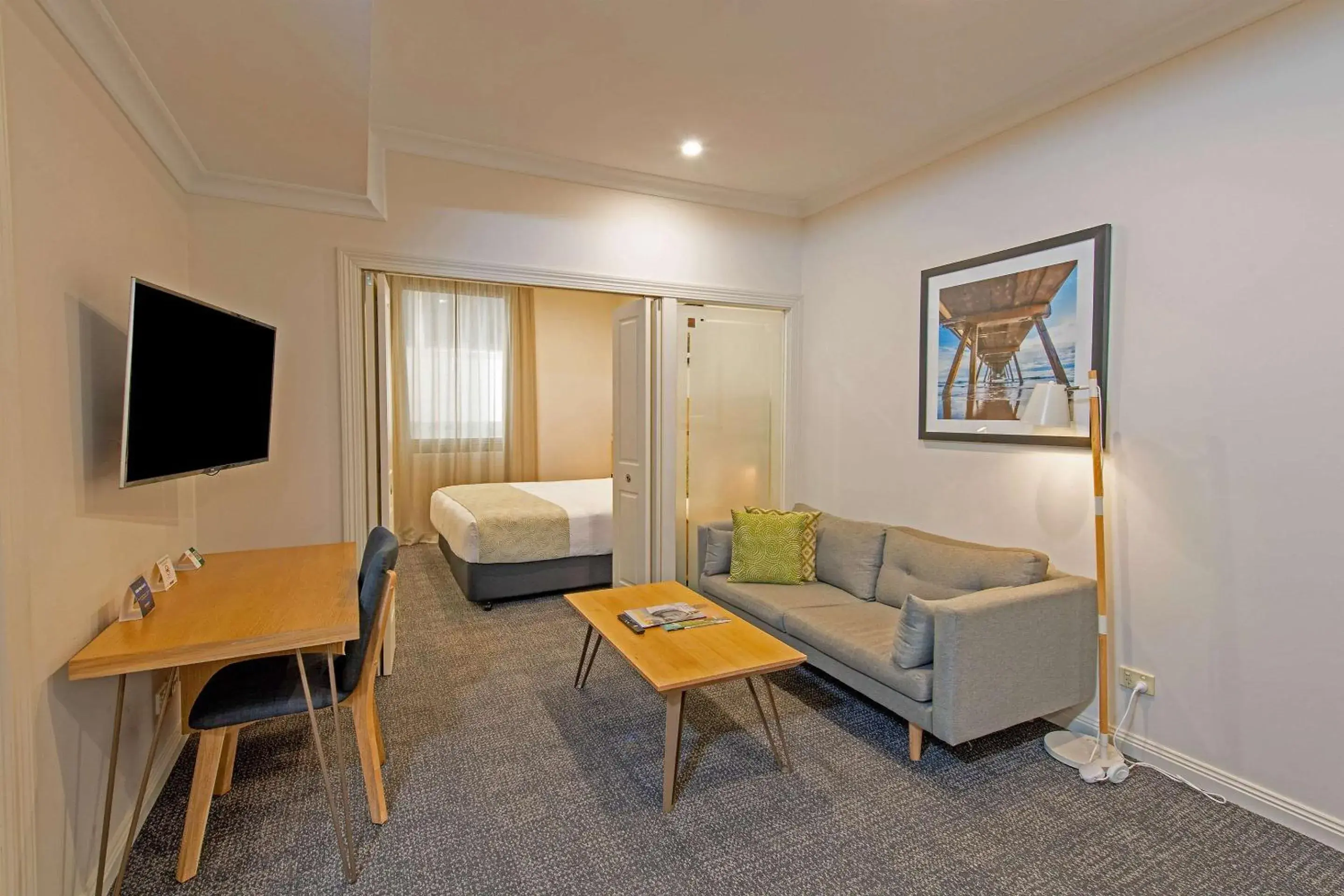 Photo of the whole room, Seating Area in Quality Apartments Adelaide Central