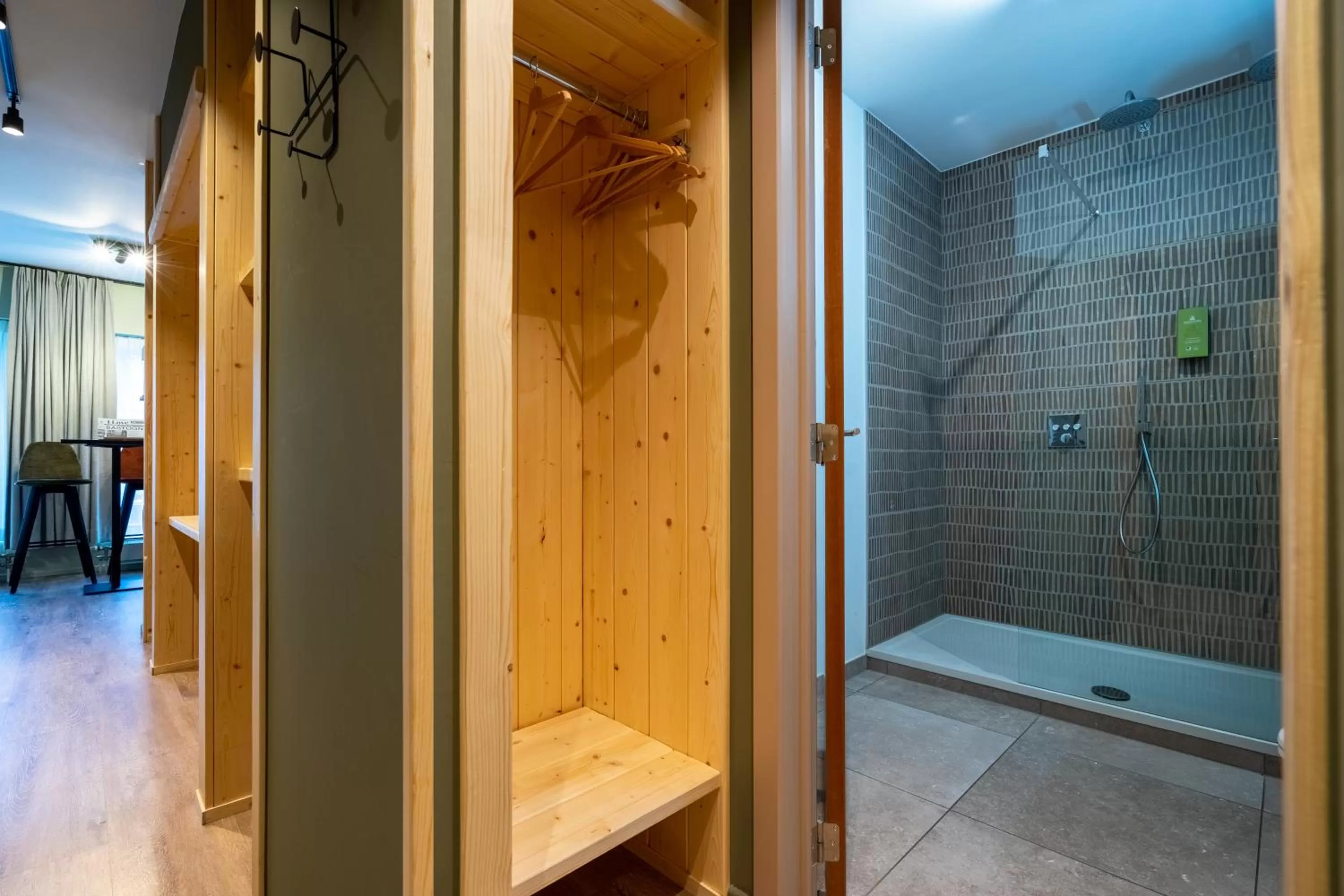 Shower in Appart hôtel En Ville