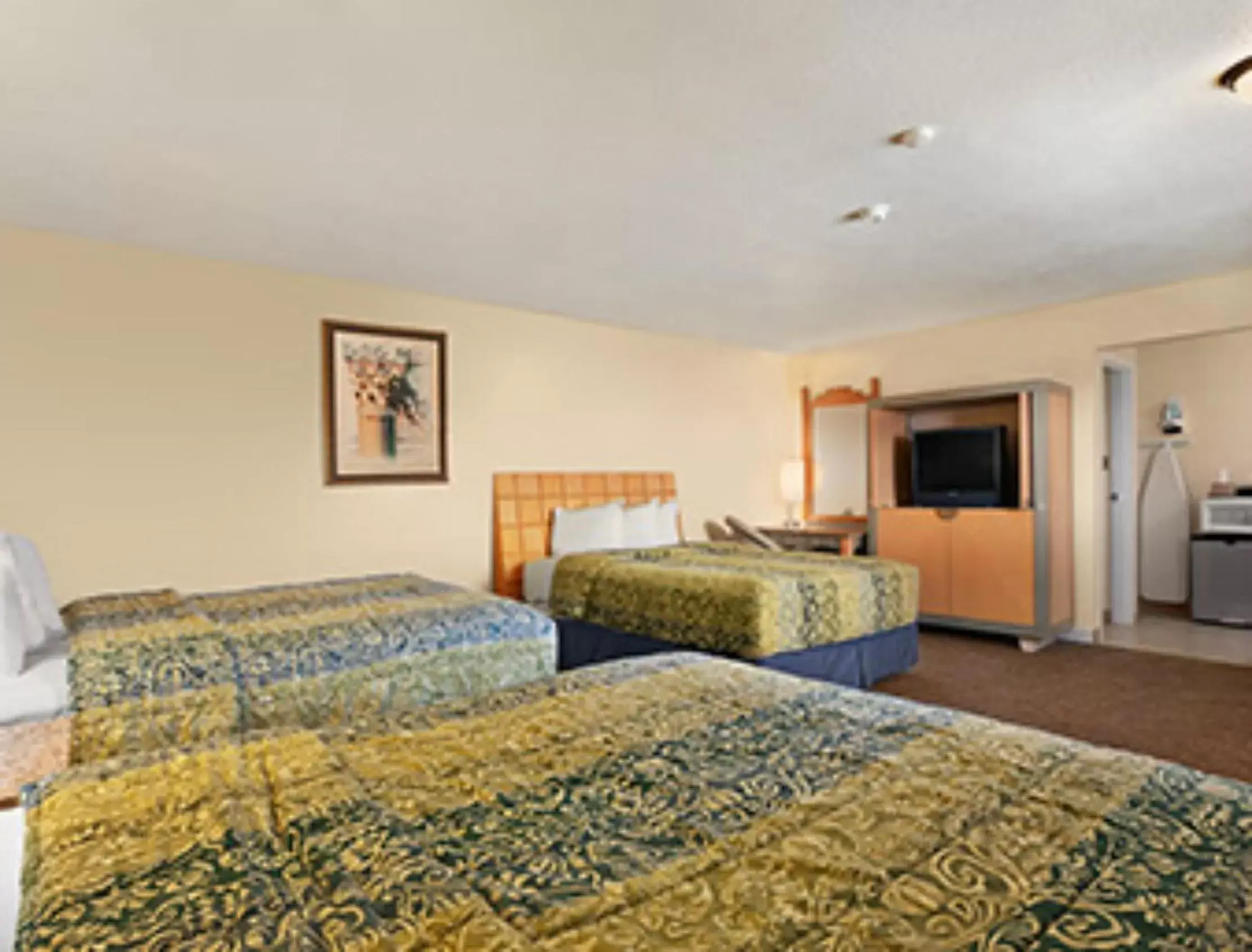 Queen Room with Three Queen Beds - Non-Smoking in Travelodge by Wyndham Clovis