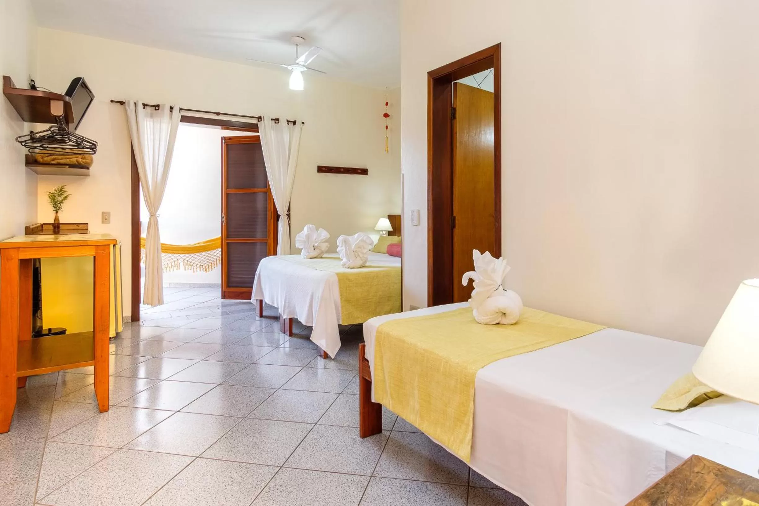 Bed in Pousada Vivamar