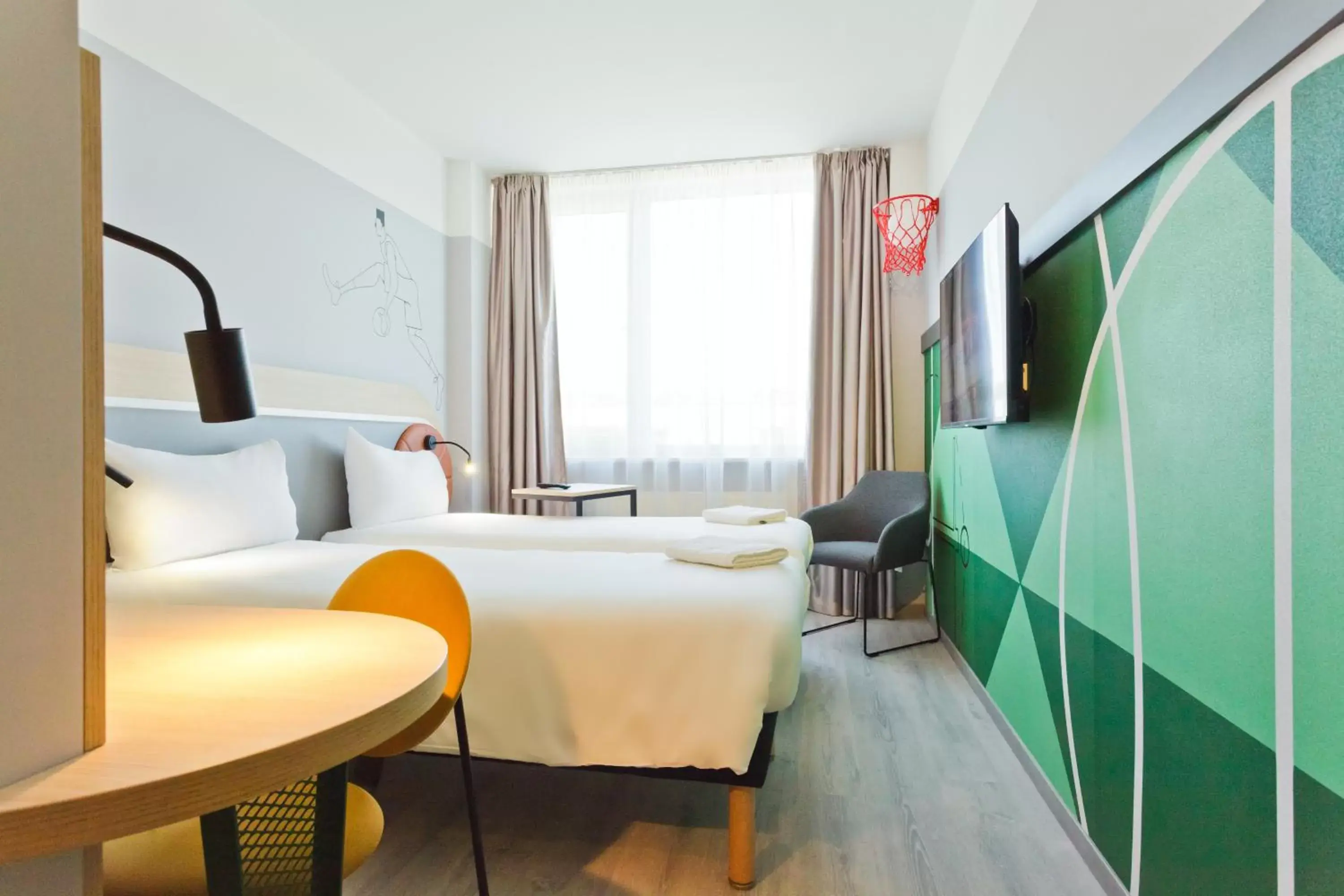 Bed in IBIS Styles Kaunas Centre