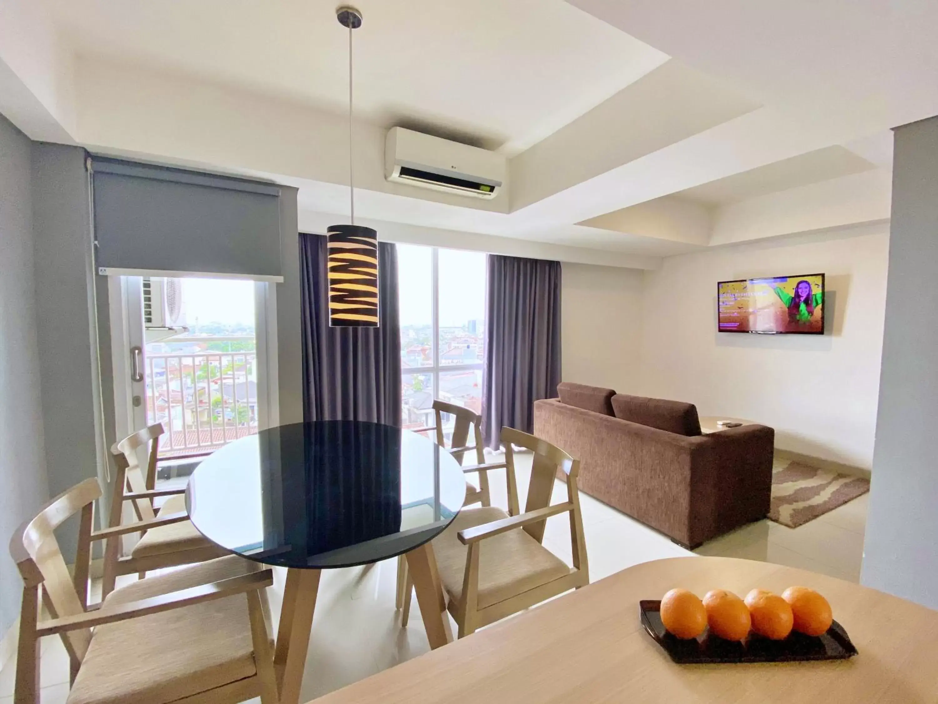 Bedroom, Dining Area in Harper MT Haryono by ASTON