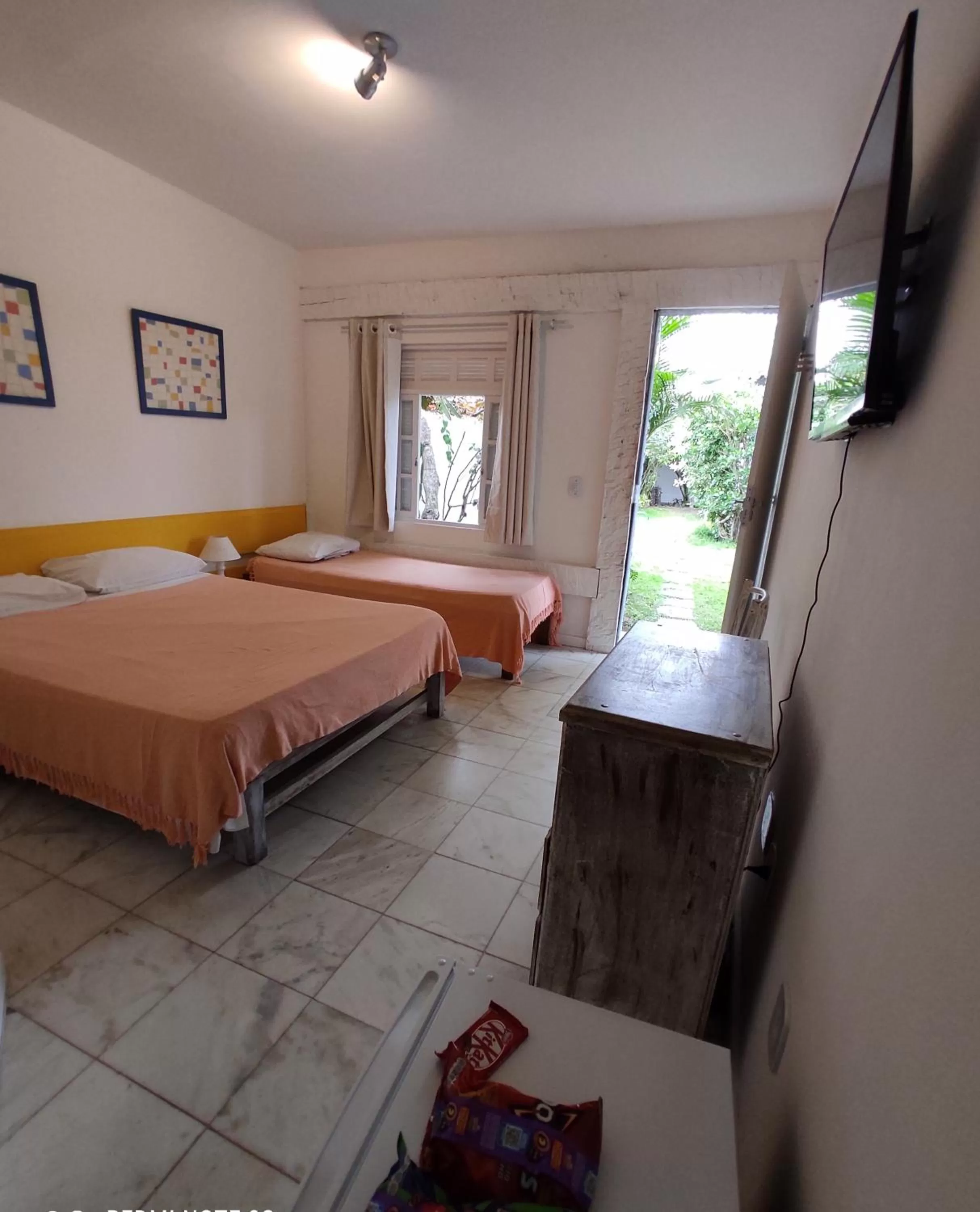 Bed in Pousada Manaaki