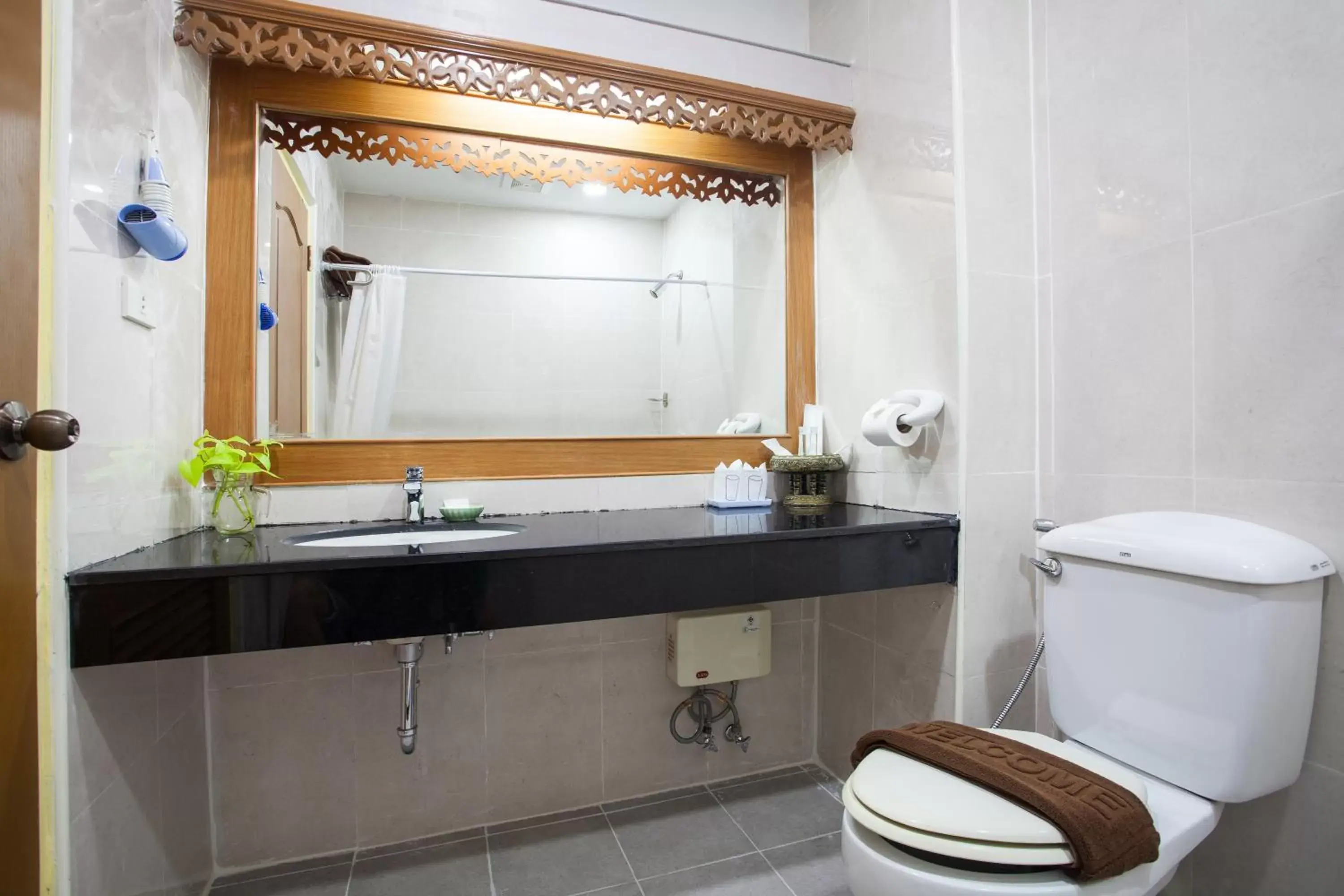 Bathroom in Diana Garden Resort - SHA Extra Plus