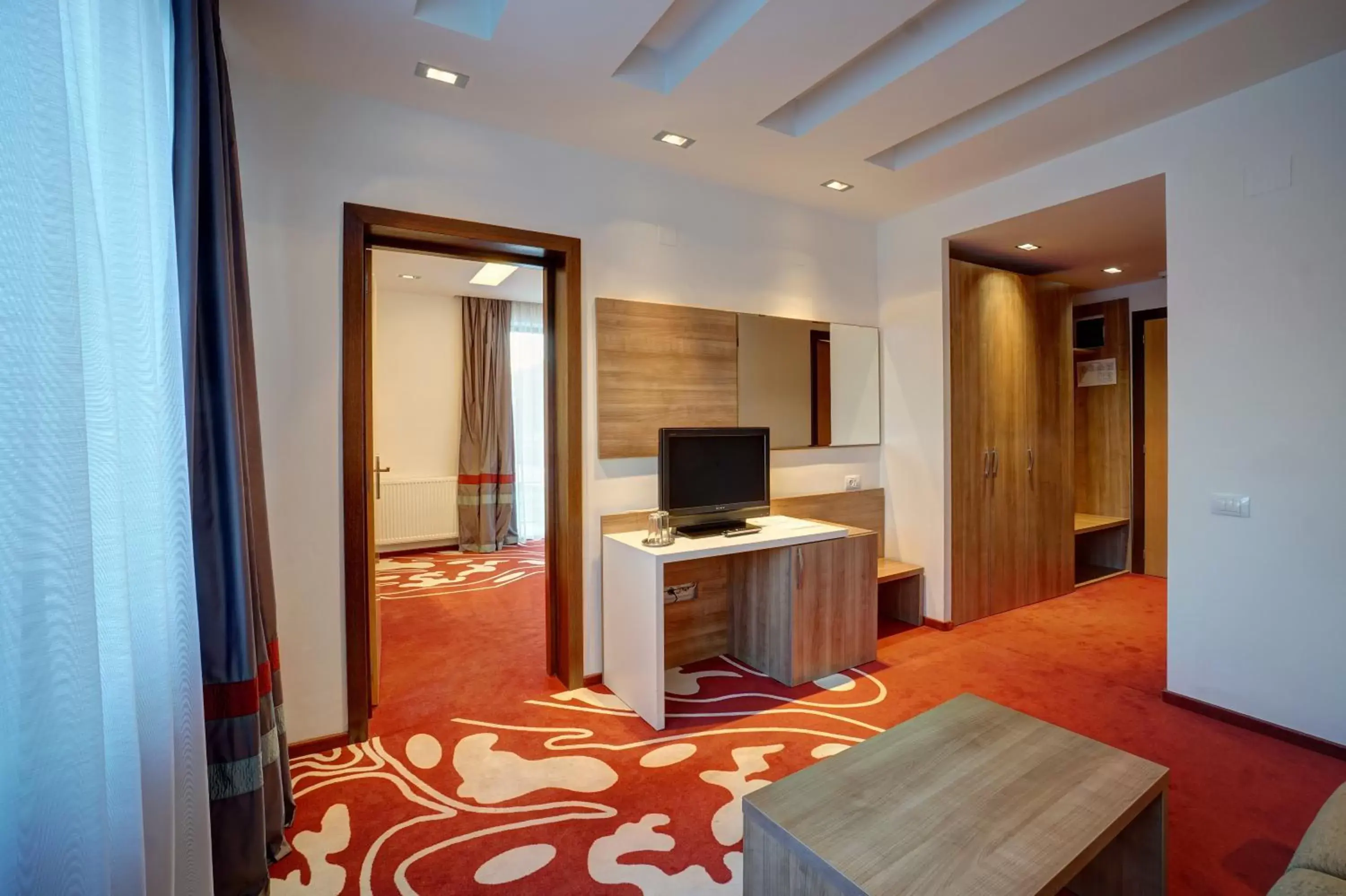 Living room, TV/Entertainment Center in Hotel Ave Lux