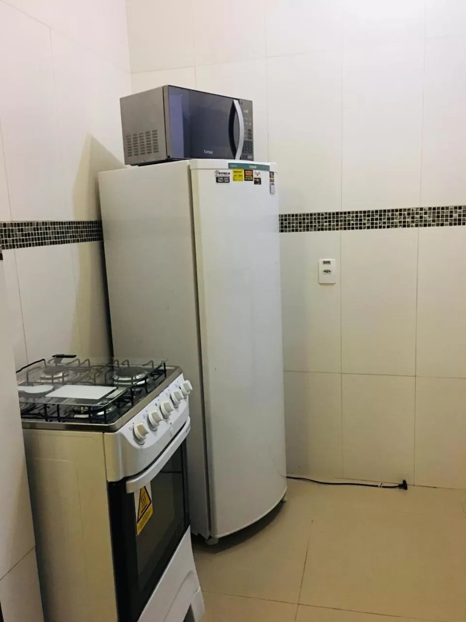 Kitchen or kitchenette in Hotel das Palmas