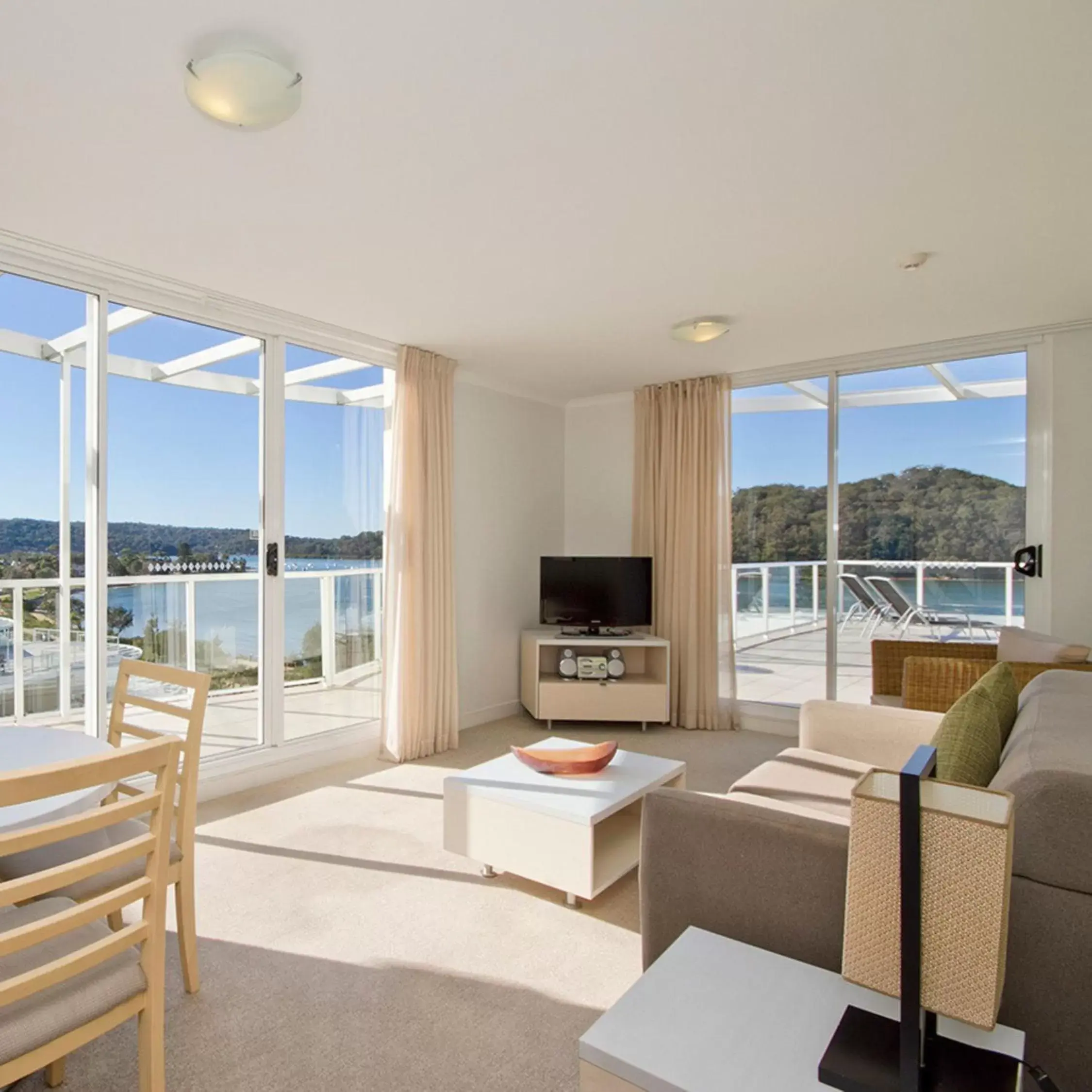 Living room, Sea View in Mantra Ettalong Beach