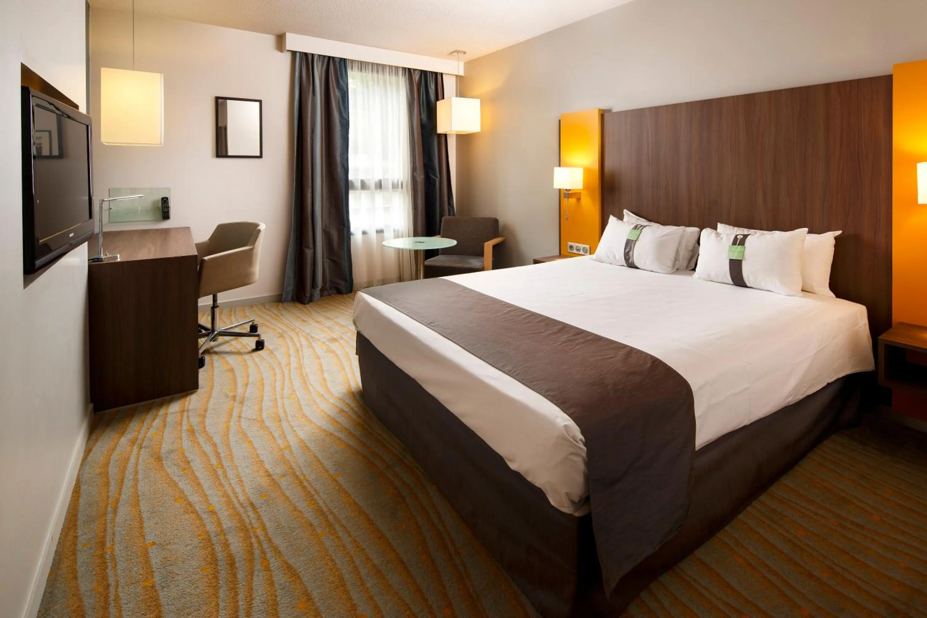 Photo of the whole room, Bed in Holiday Inn Lyon Vaise by IHG
