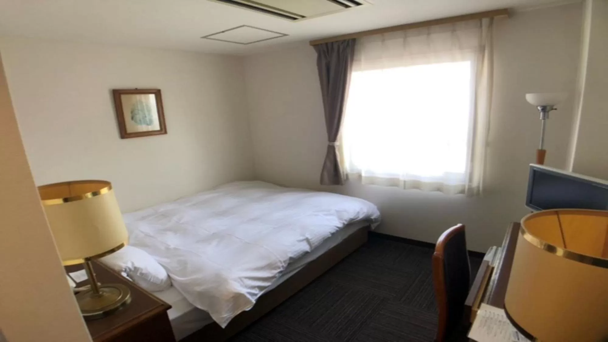 Bed in 小牧シティホテル