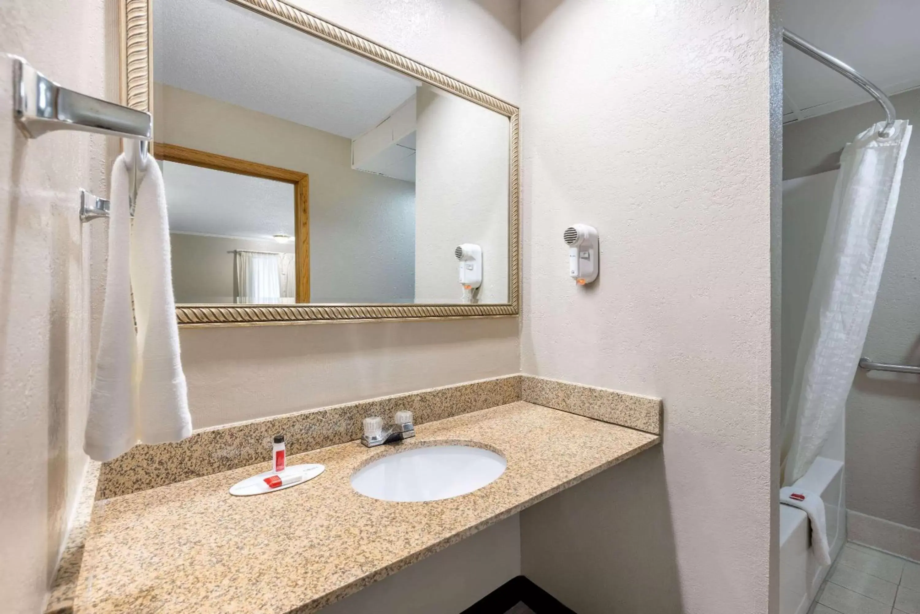 Bathroom in Super 8 by Wyndham Kansas City Airport North