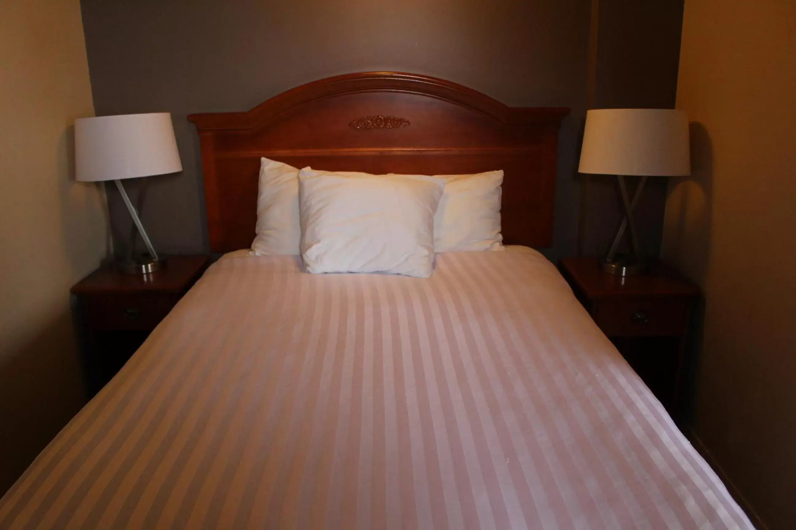 Bed in Ramada by Wyndham Campbell River