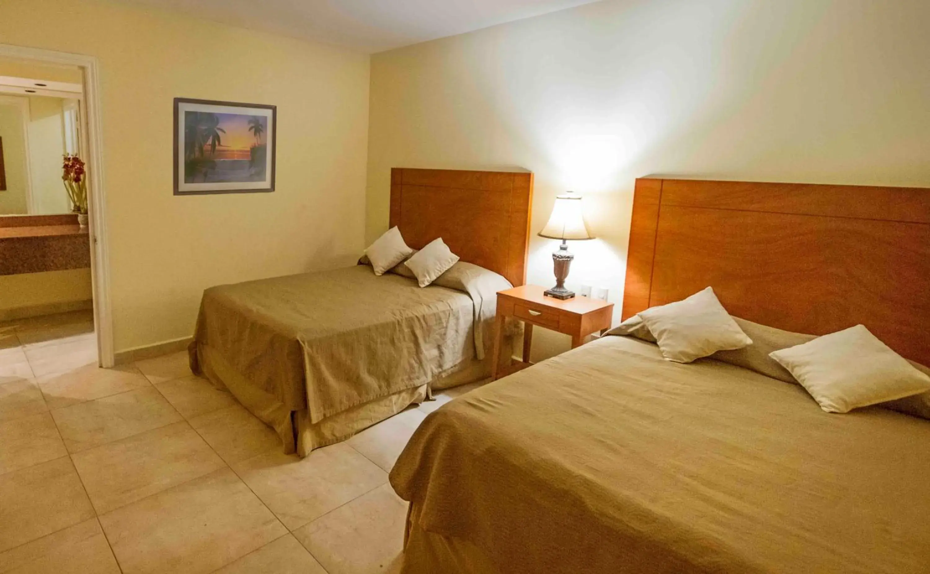 Bed in Hotel Arenas Del Mar Resort