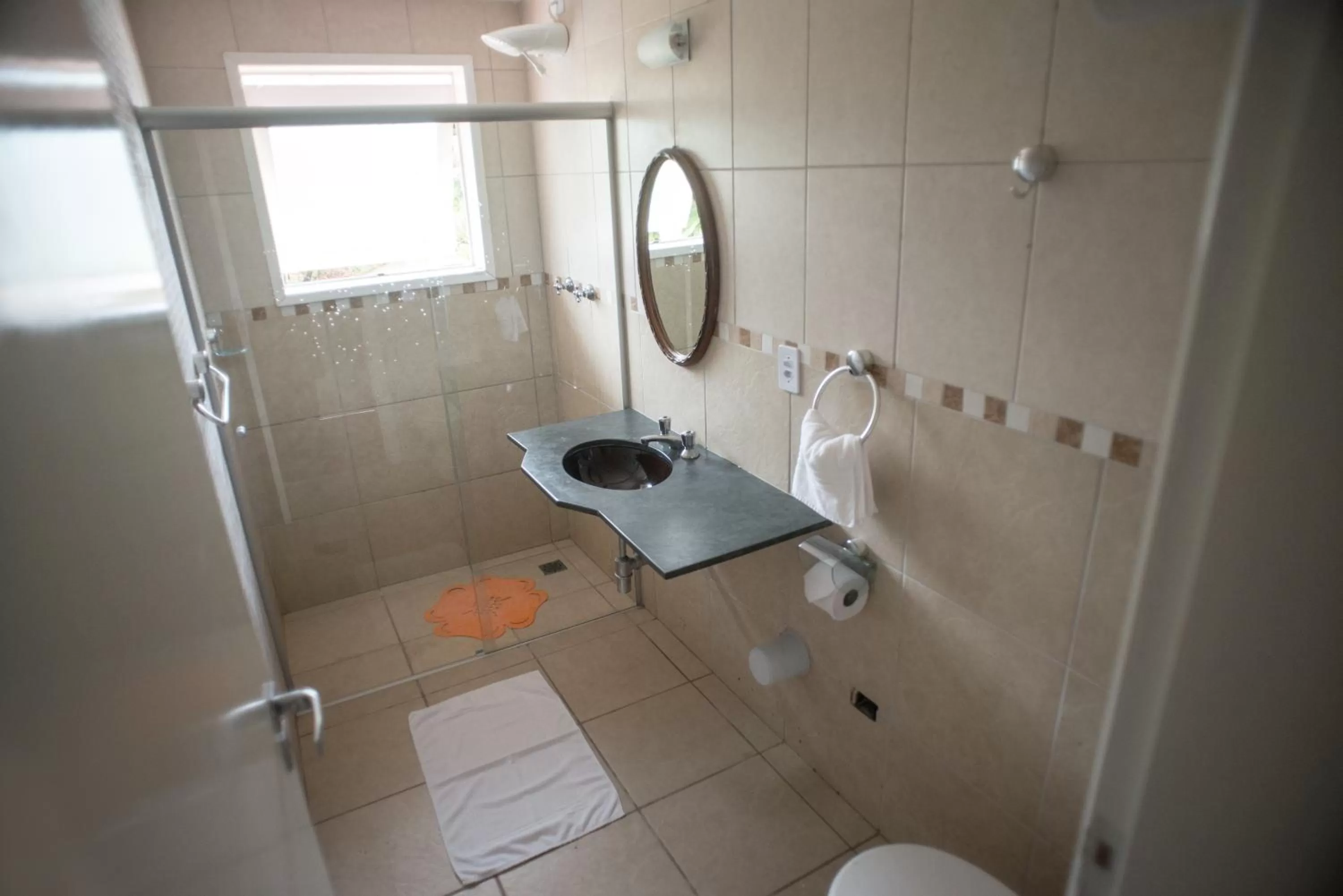 Bathroom in Hotel e Pousada Pouso54