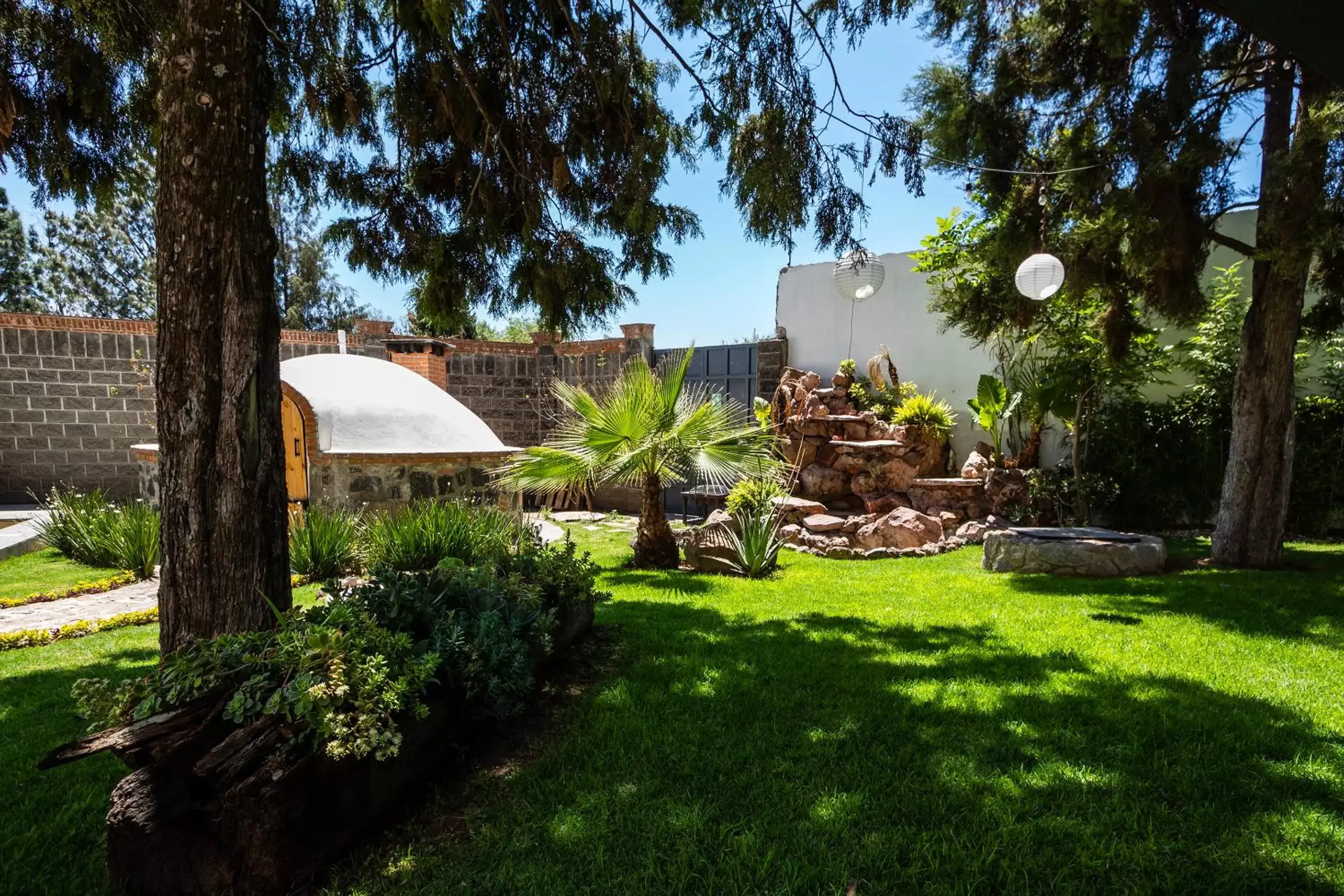 Garden in Hotel Boutique Camino Del Bosque by Rotamundos