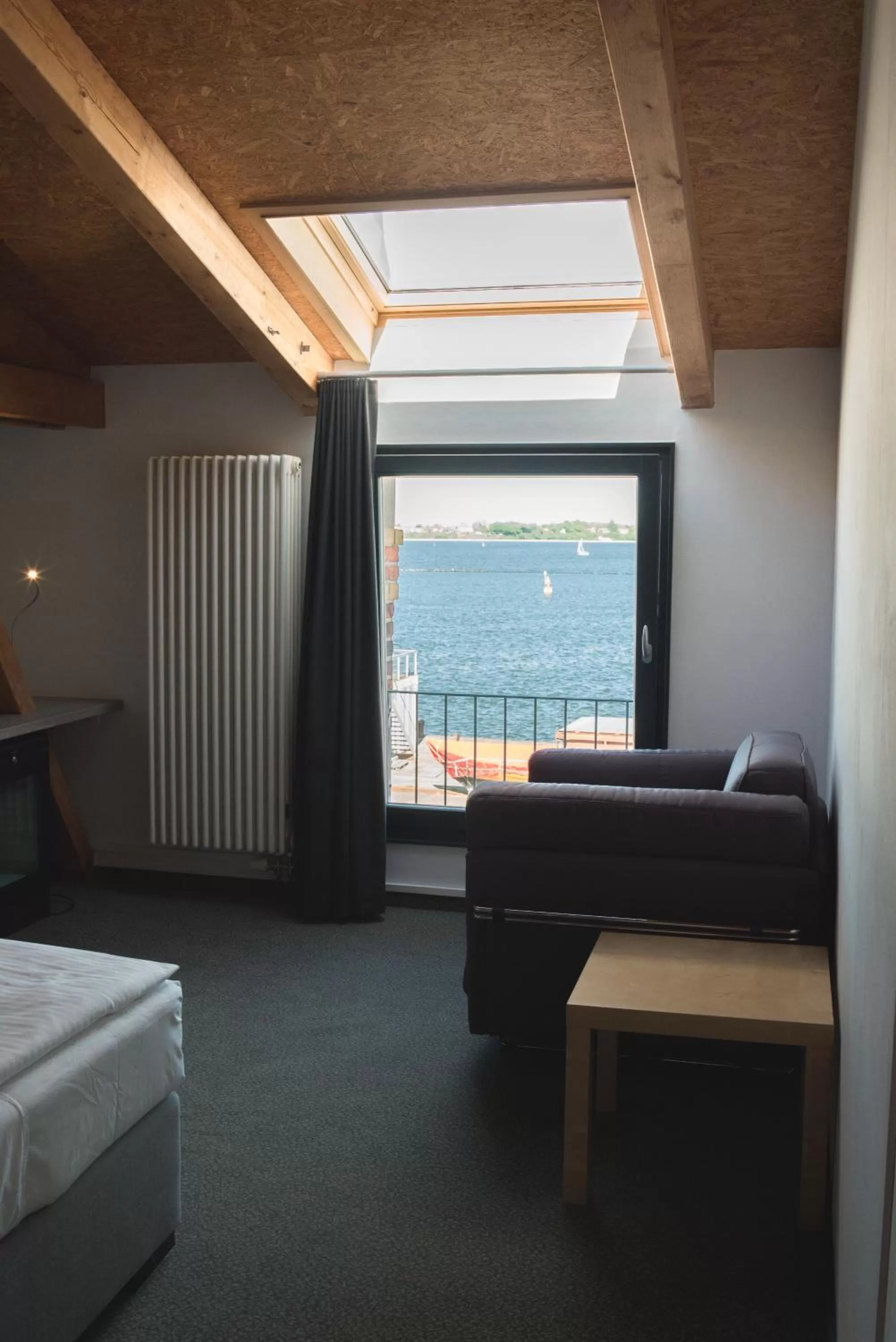 Seating area, Bed in Hotel Alter Hafenspeicher