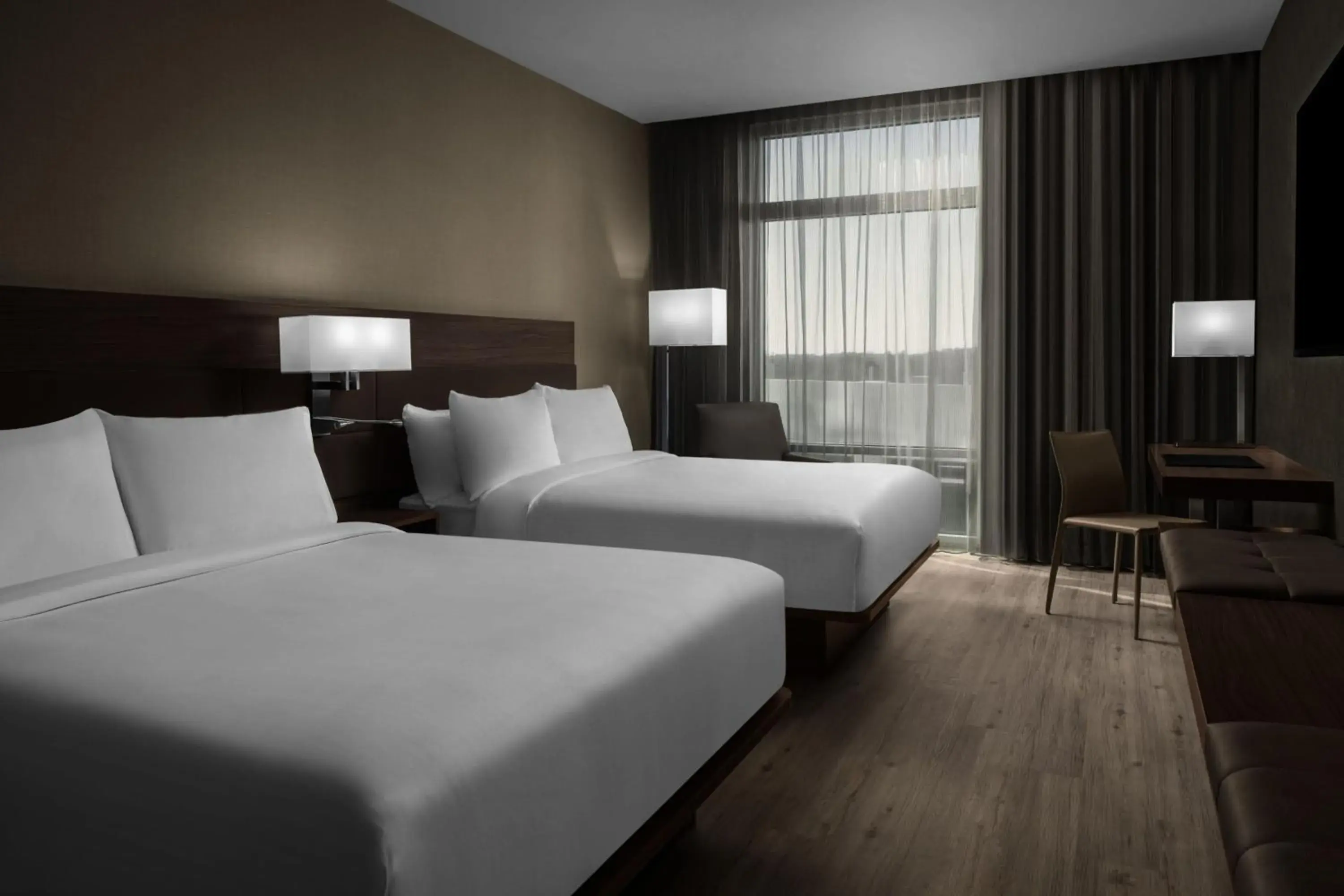 Photo of the whole room, Bed in AC Hotel by Marriott Lansing University Area