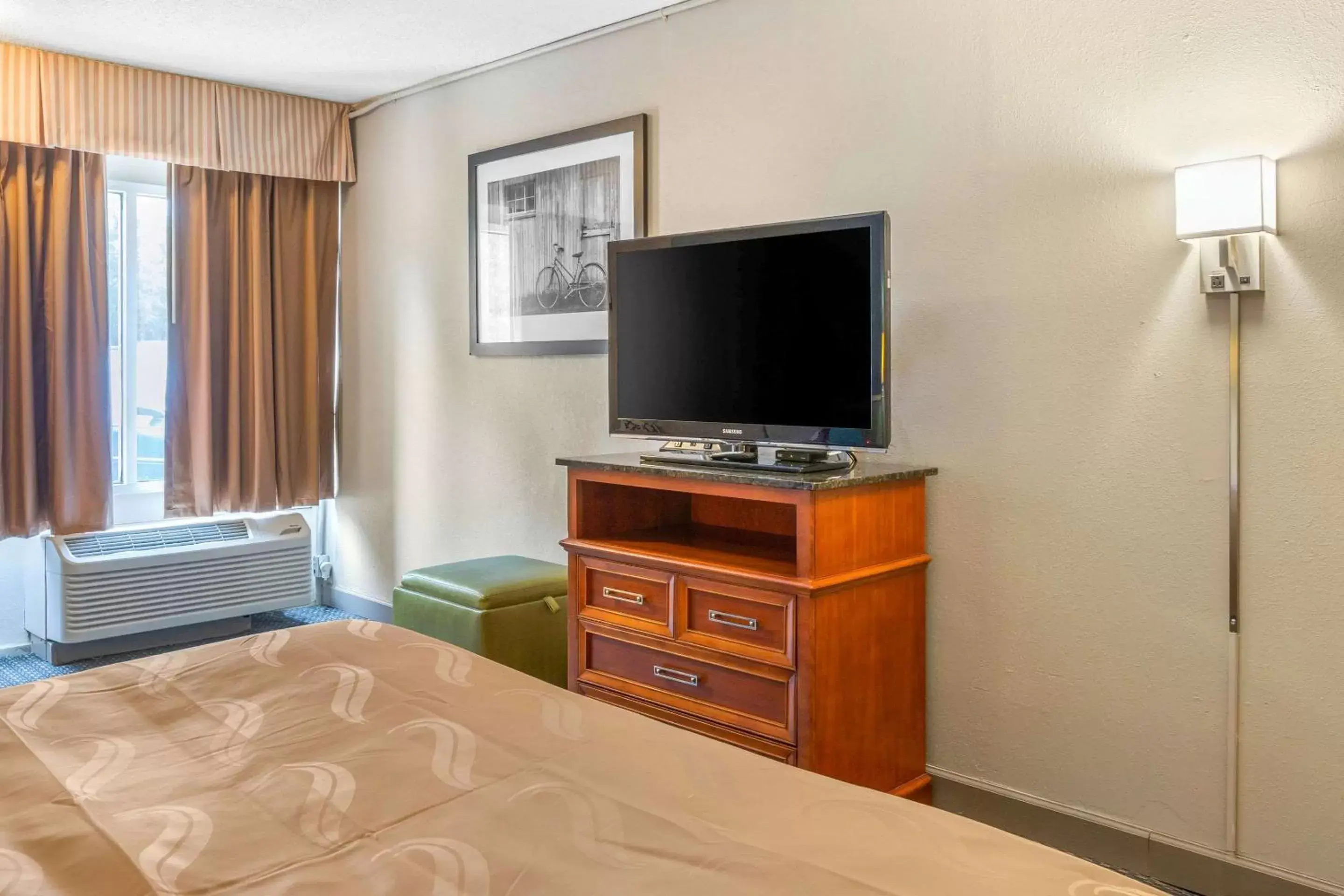 Photo of the whole room, TV/Entertainment Center in Quality Inn & Suites Apex-Holly Springs
