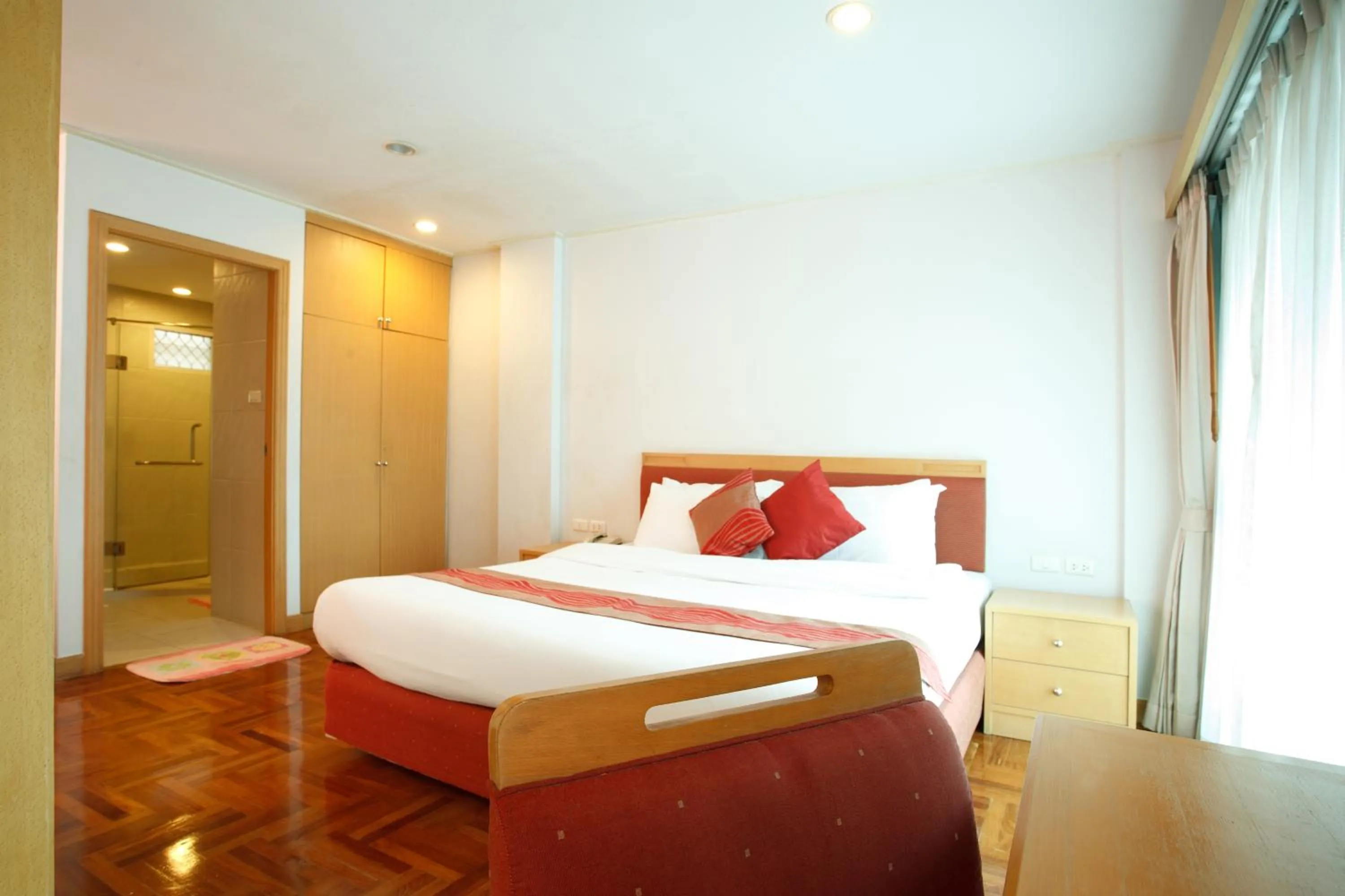 Bed in Chaidee Mansion