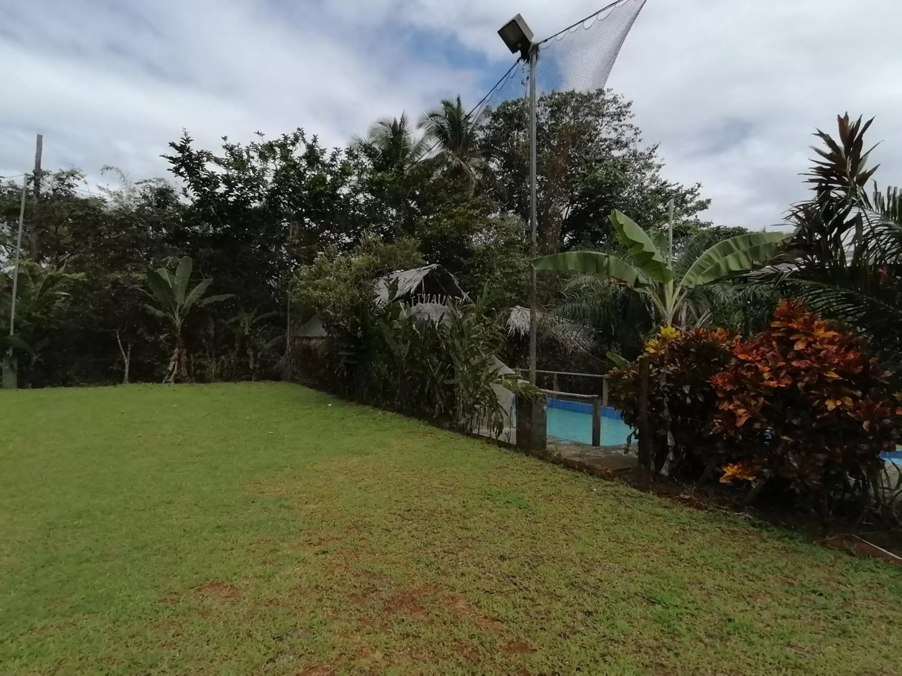 Garden, Swimming Pool in Iguanitas Lodge