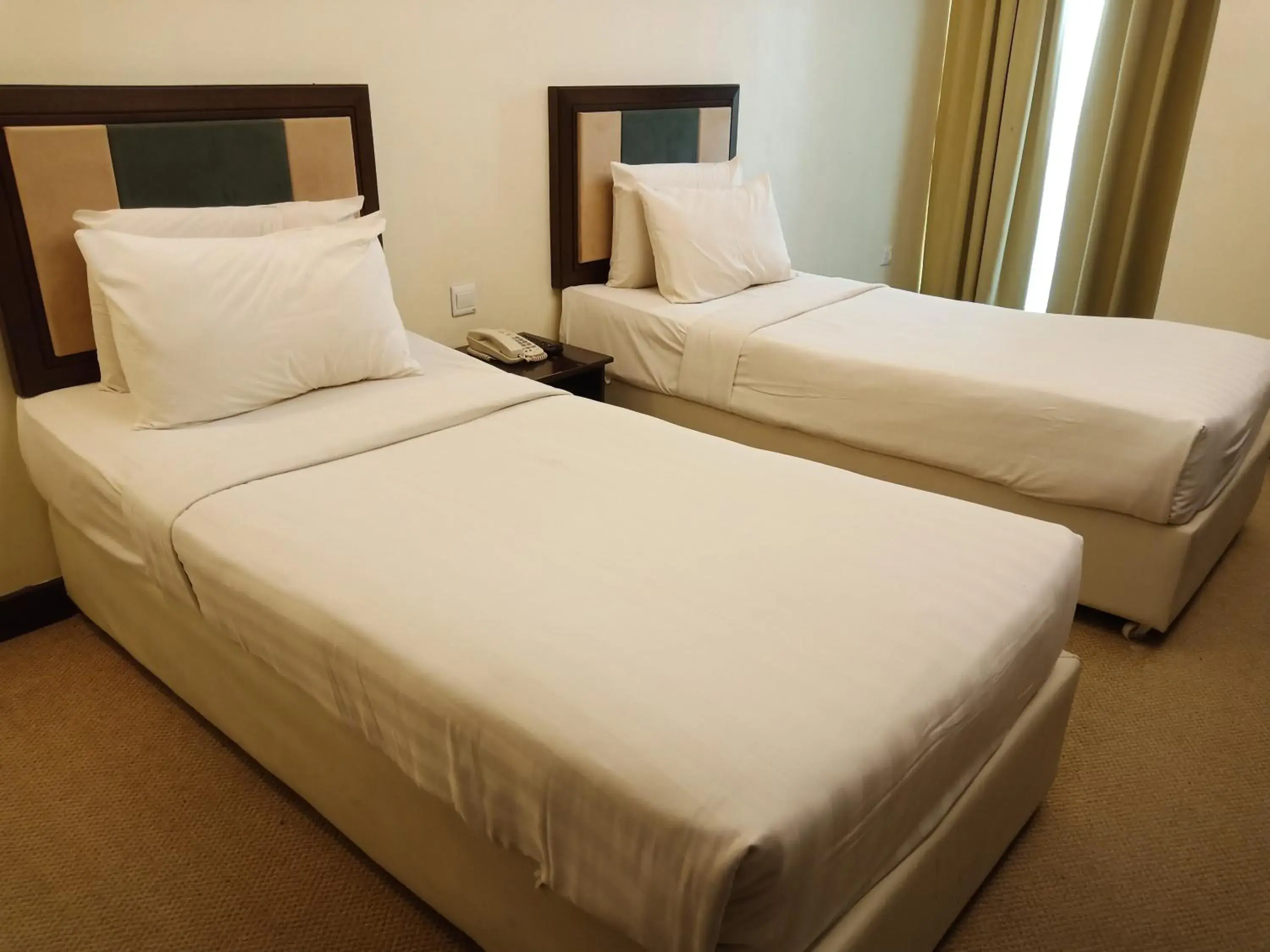 Bed in Hotel Taiping Perdana