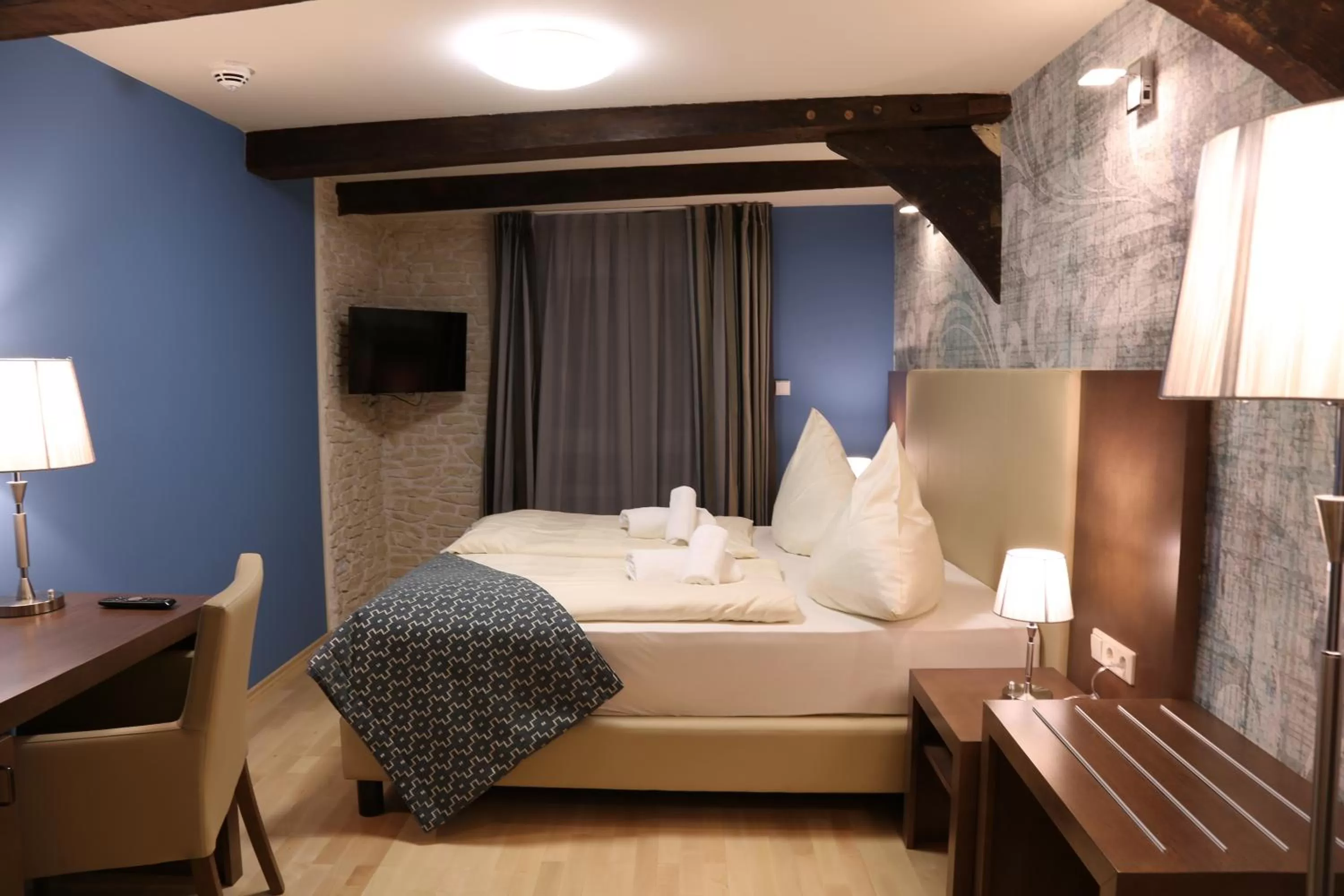 Photo of the whole room, Bed in Markthotel Warendorf