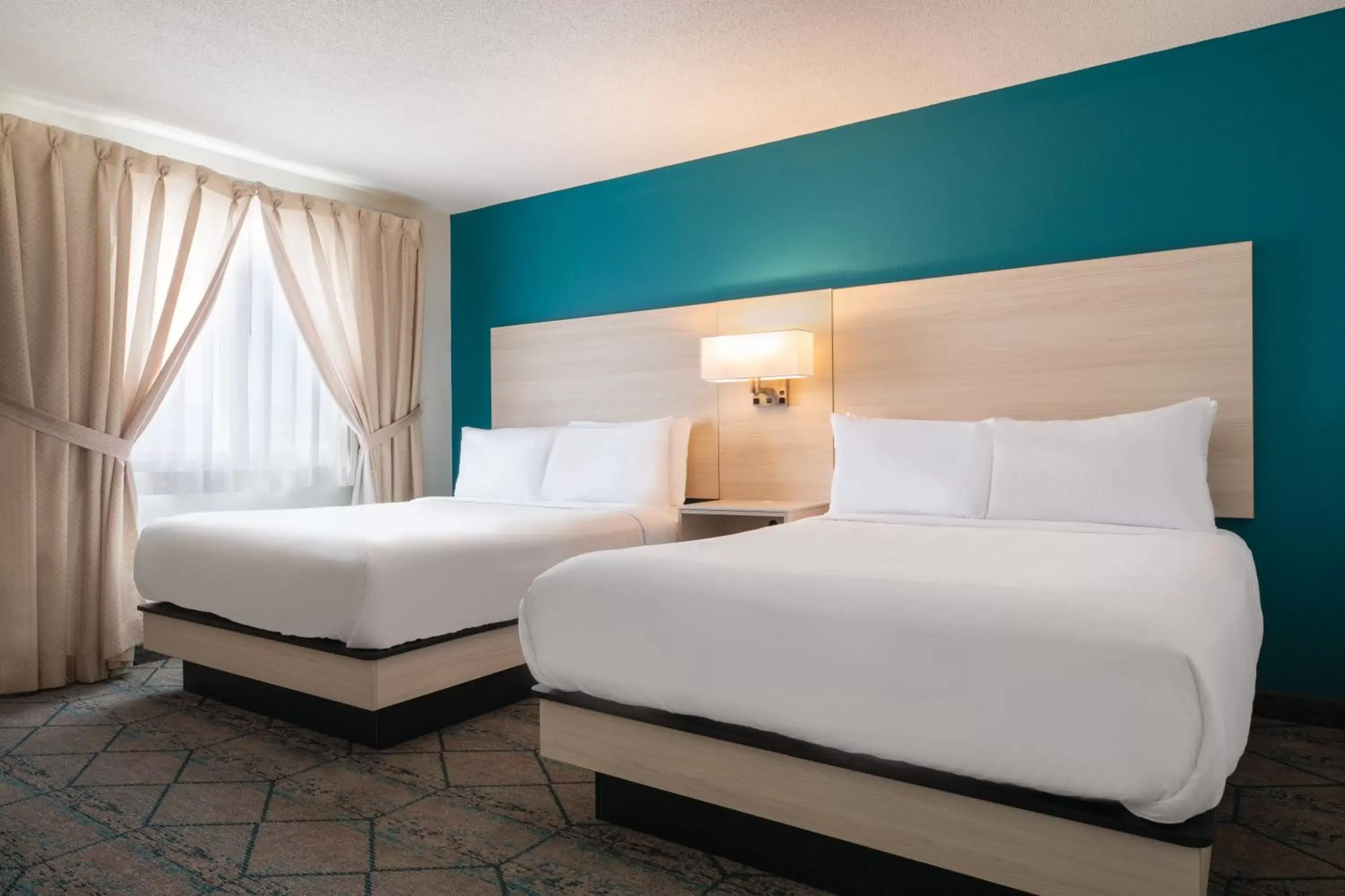 Bed in Ramada by Wyndham Miramichi New Brunswick