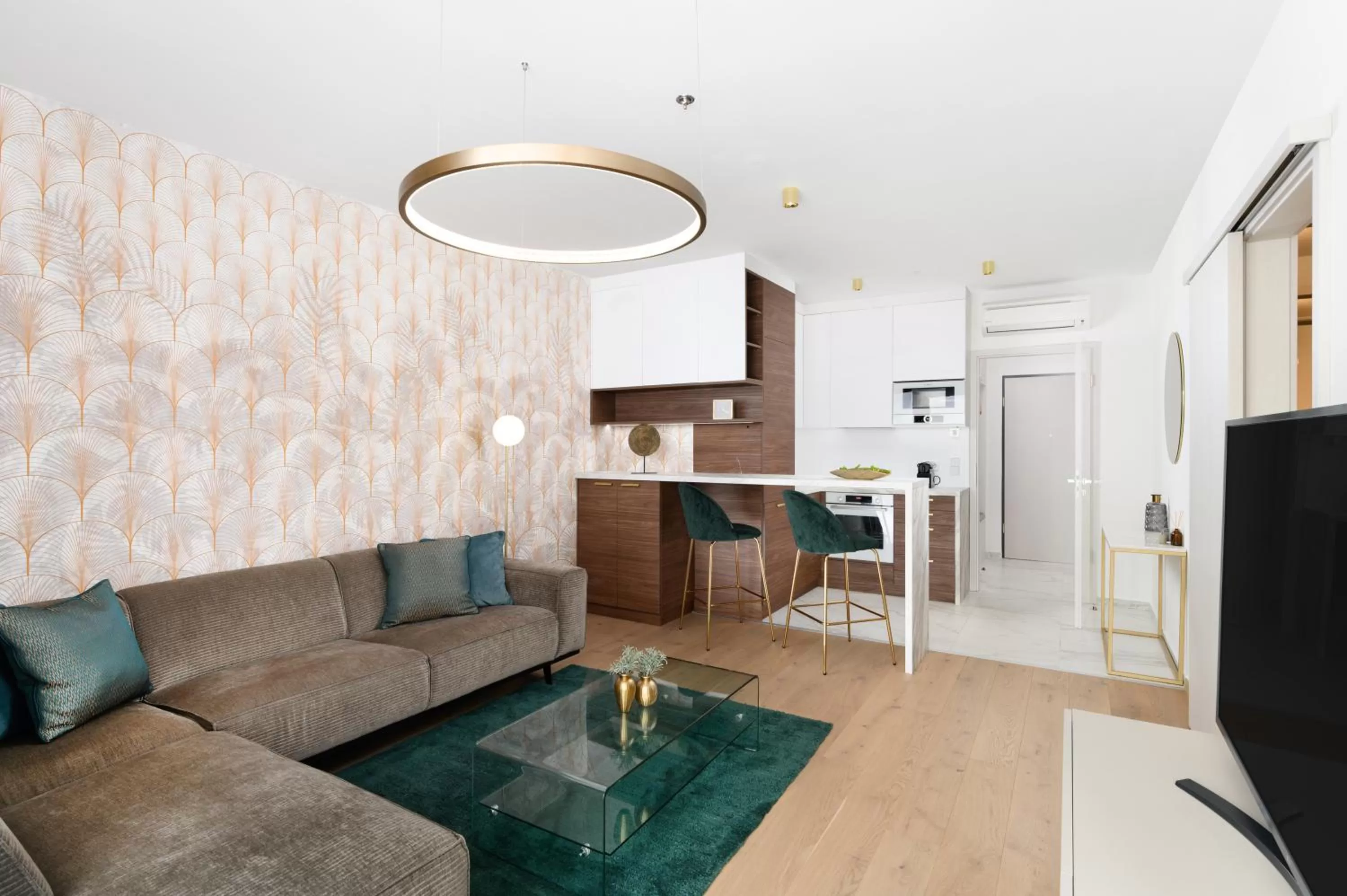 Living room in Emerald Downtown Luxury Suites by Continental Group