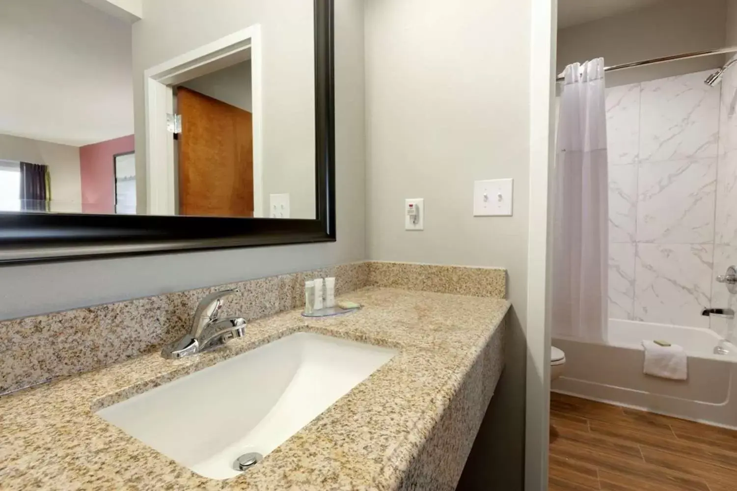 Bathroom in Super 8 by Wyndham Carrizo Springs